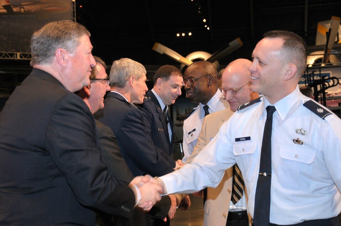Secretary of the Air Force Michael Donley shakes hands with Lt. Col. Ceir Coral, deputy chief for the KC-46 Production Integrated Product Team, during a visit to Wright-Patterson Air Force Base, Ohio, on March 21, 2011.  Secretary Donley; Under Secretary of Defense for Acquisition, Technology and Logistics Dr. Ashton Carter; Air Force Chief of Staff Gen. Norton Schwartz; and KC-46 Program Executive Officer Brig. Gen. Christopher Bogdan expressed their appreciation to more than 230 KC-46A source selection team members at the National Museum of the United States Air Force.  (U.S. Air Force photo/Niki Jahns)