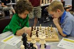A.J. Trimble (left) and Gracin Harris peer over a chess board during the Randolph Youth Center’s chess tournament March 12. Gracin Harris was the winner in the 6- to 8-year old group. Christopher Phan and Eric Ayers (not pictured) were the winners of the 9- to 12- and 13- to 15- year old groups, respectively.
(Courtesy photo)