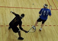 MINOT AIR FORCE BASE, N. D. -- Airman 1st Class Kashif Livingston, 5th Aircraft Maintenance Squadron maintenance specialist (Left), competes at the North Dakota Racquetball Association State Championship “B” Division held at The Family YMCA in Minot March, 20. Airman Livingston was awarded the first place medal after defeating several opponents at the competition. 