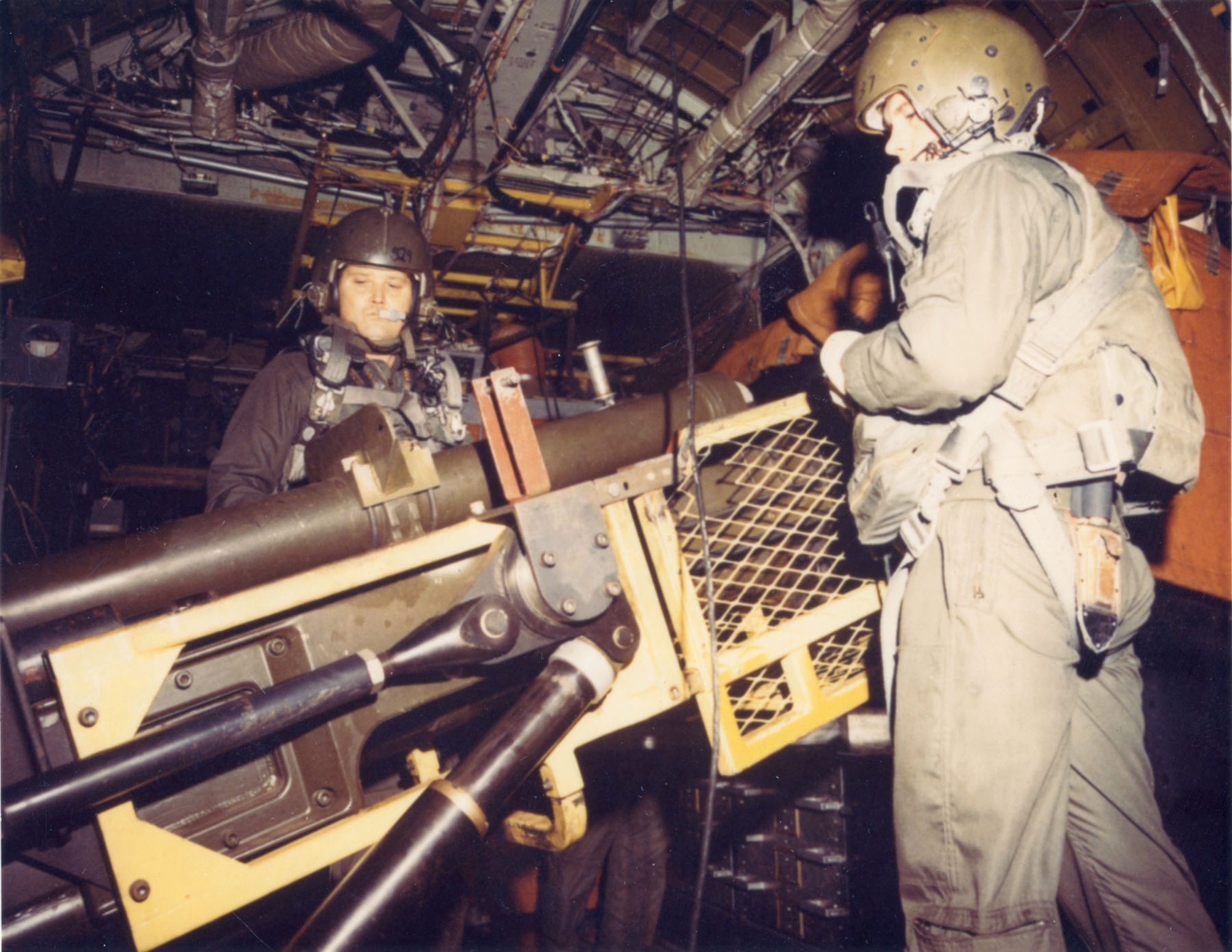Master Sgt. Jacob Mercer (left) prepares to load a AC-130 Spectre 105mm howitzer. Mercer was one of the crewmembers killed on June 18, 1972. (U.S. Air Force photo)
