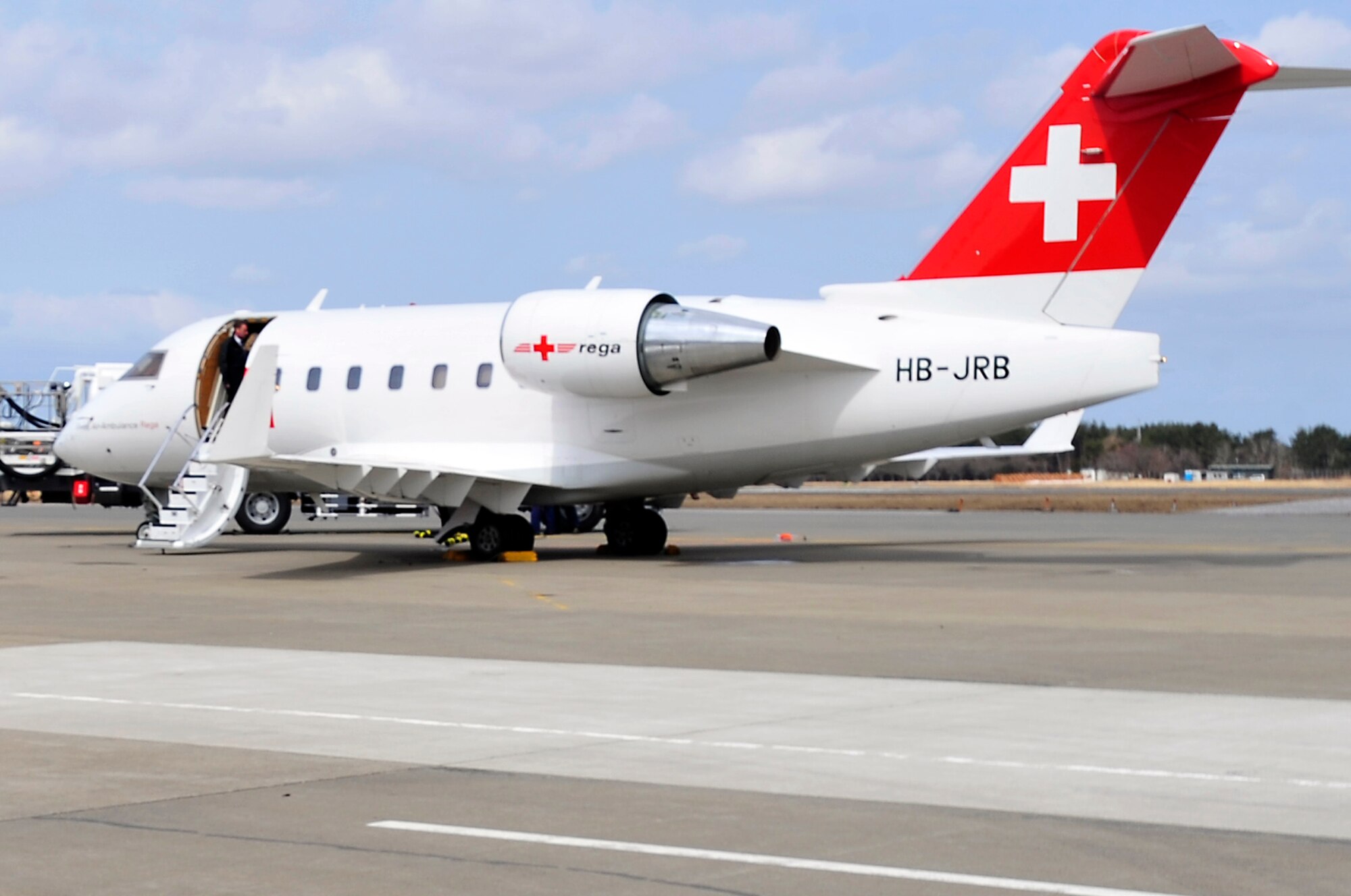 MISAWA AIR BASE, Japan -- A Swiss Air-Ambulance prepares for departure Mar. 21. The Swiss Air-Ambulance is an ambulance with wings used for international patient transports available for flights worldwide within just a few hours. (U.S. Air Force photo by Staff Sgt. Marie Brown\Released)
