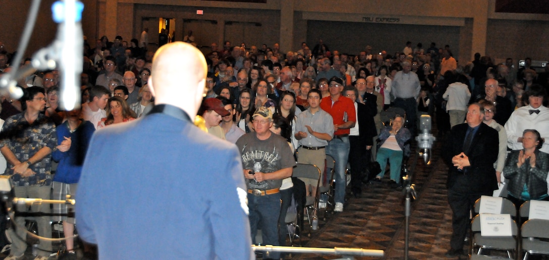 The audience claps in rhythm with The U.S. Air Force Band Airmen of Note, performing the Air Force song March 18 at the Meadowview Convention Center in Kingsport, Tenn. The Note is traveling through Virginia, Tennessee, Mississippi and Arkansas on it’s 2011 Spring Tour. (U.S. Air Force photo by Airman 1st Class Tabitha N. Haynes)