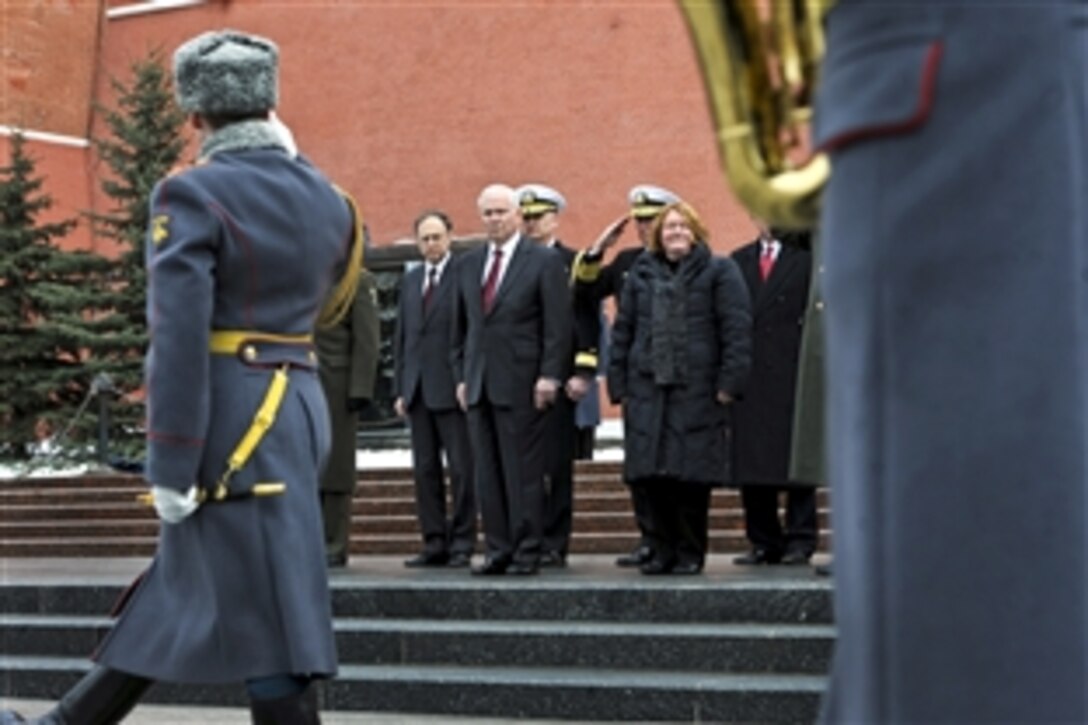 U.S. Defense Secretary Robert M. Gates and his wife, Becky, participate in a welcoming ceremony at the Tomb of the Unknown Soldier in Moscow, March 22, 2011.