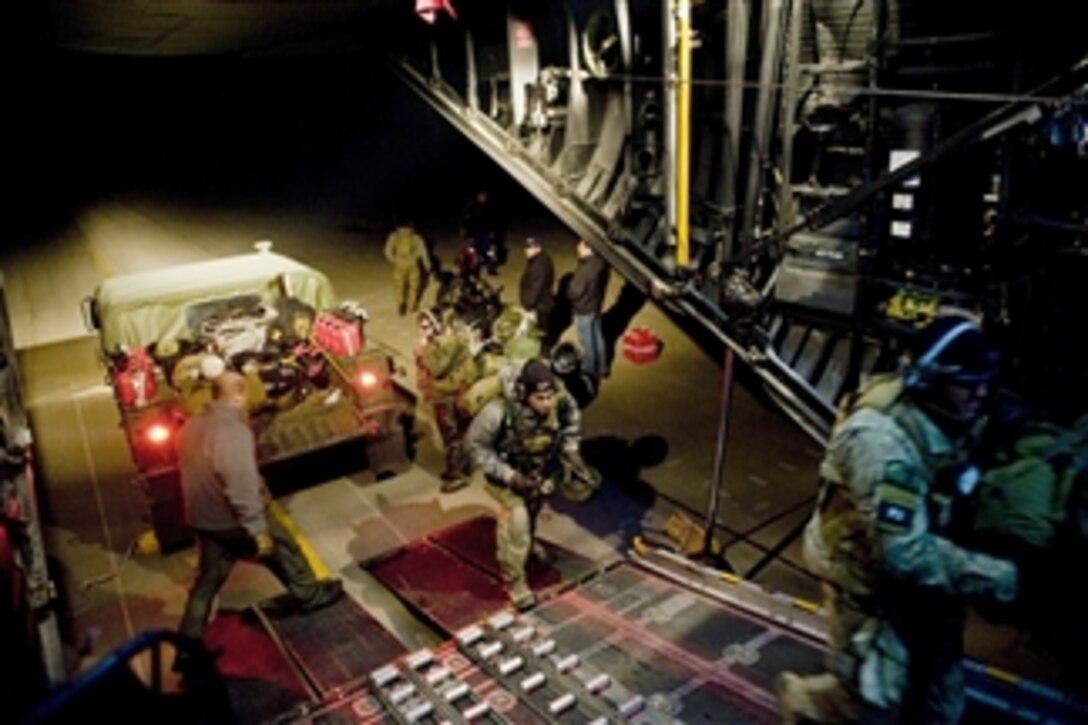 Members of the 353rd Special Operations Group off-load and upload new gear at Sendai Airport, Japan, on March 16, 2011.  The 353rd Special Operations Group is establishing a usable runway at Sendai Airport to help with Japan's earthquake and tsunami relief.  Operation Tomodachi is the U.S. military's humanitarian and relief effort in response to the 9.0-magnitude earthquake and tsunami that struck Japan on March 11.  