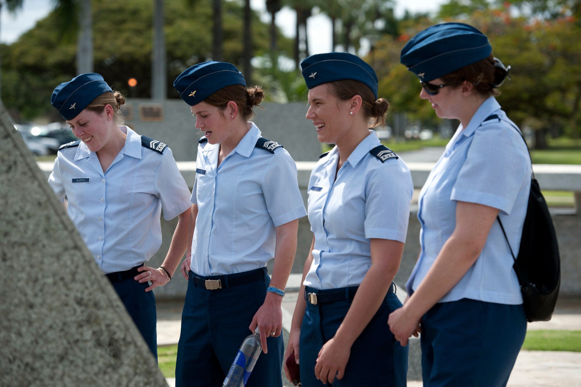 Cadets from the U.S. Air Force Academy read the historical plaques on display Mar. 21 in Atterbury Circle at Joint Base Pearl Harbor Hickam, Hawaii. The 15th Wing hosted the cadets from the "Fightin' Fourth" squadron at Peterson Air Force Base, Colo. during their week-long visit to the base. (U.S. Air Force photo/Staff Sgt. Nathan Allen)