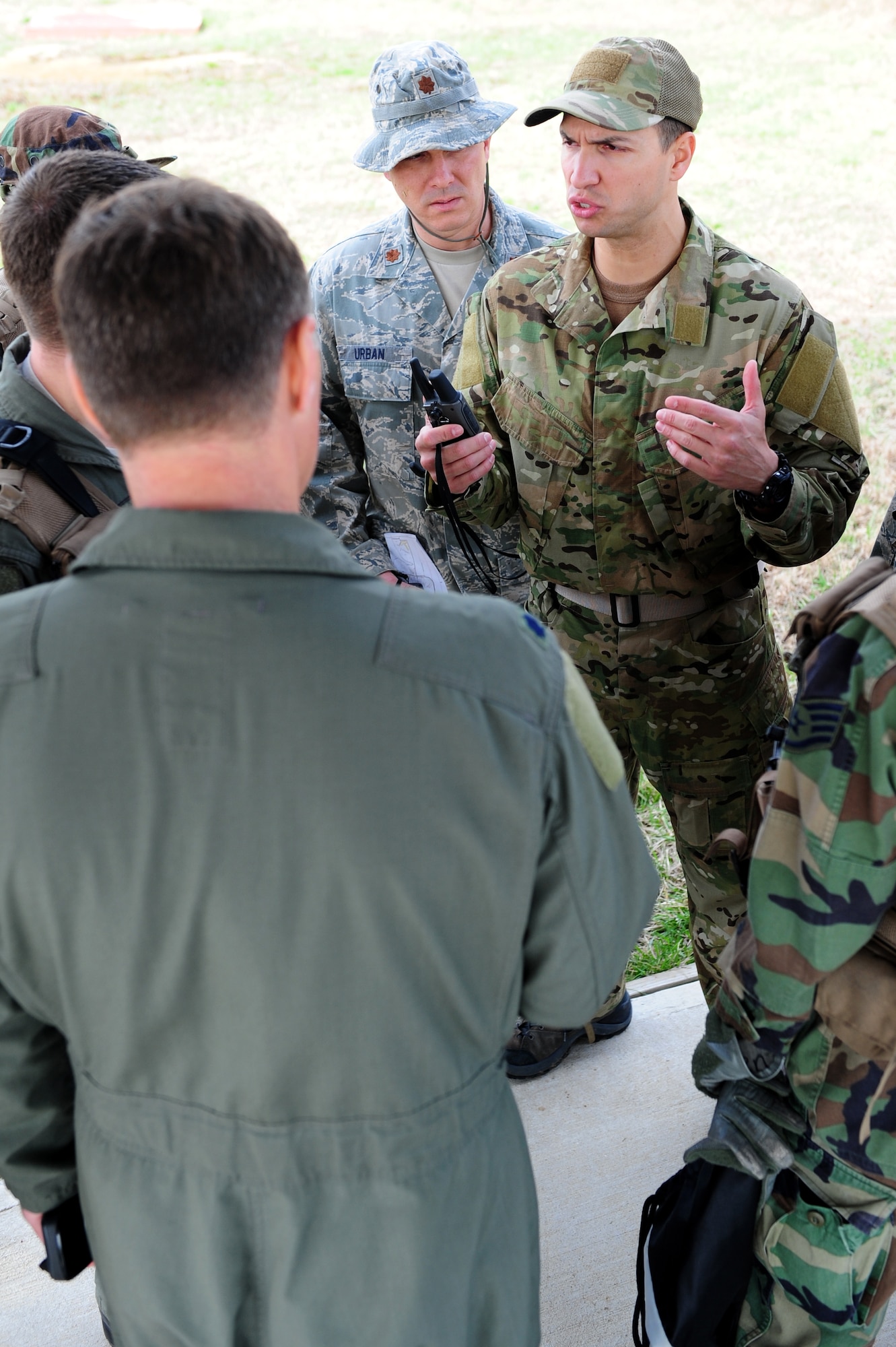 Tech. Sgt. Robert Graham, 375th Operations Support Squadron S.E.R.E specialist, gives a brief overview of the operation of the radios and proper radio etiquette during  Combat Survival Training at the Illinois Army National Guard’s Sparta Training Area, Sparta, Ill. on March 22, 2011. Active aircrews will have refresher training every 3 years or as needed in accordance with their deployment rate. (U.S. Air Force photo by Staff Sgt. Teresa M. Jennings)