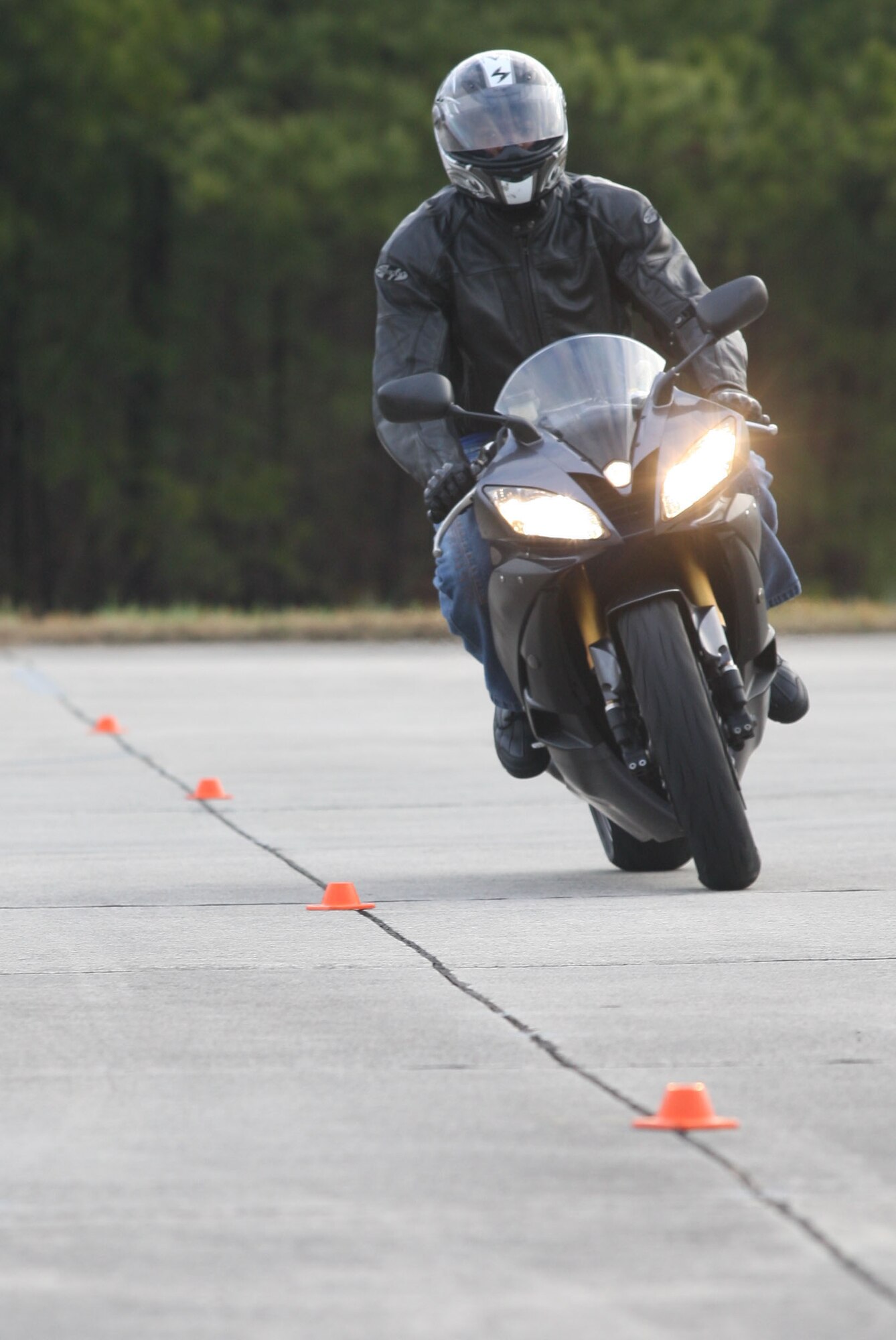Course configurations designed to challenge riders are put into place on the motorcycle range. (U.S. Air Force Photo/Don Peek)