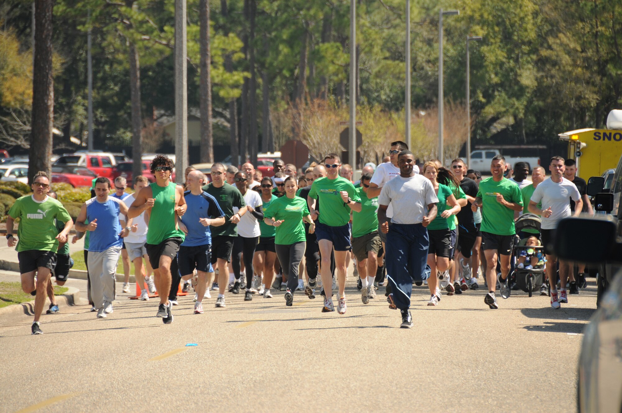 Keesler streets were awash with sweaty green shirts during the St. Patrick’s Day 5-kilometer run/walk. The race began and ended outside the Blake Fitness Facility as participants meandered through the base enjoying a warm, sunny spring day.  (U.S. Air Force photo by Kemberly Groue)