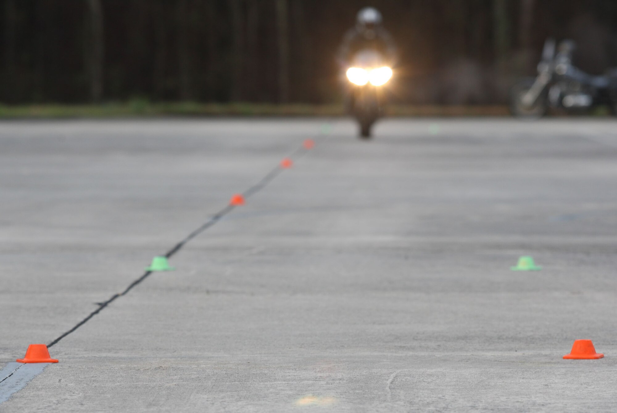 Course configurations designed to challenge riders are put into place on the motorcycle range. (U.S. Air Force Photo/Don Peek)