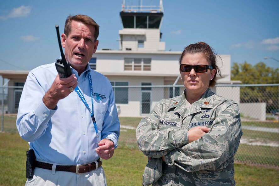 Jim Galloway, Valdosta Regional Airport manager, and Maj. Connie Van Hoesen, Air Traffic Systems Evaluation Program team chief from Langley Air Force Base, Va., discuss airport plans and operations March 22 at the Valdosta Regional Airport in Valdosta, Ga. Major Hoesen and other members of the ATSEP team visited the airport to get a better understanding of how it operates and works in cooperation with Moody Air Force Base, Ga. (U.S. Air Force photo/Staff Sgt. Jamal D. Sutter)(RELEASED)