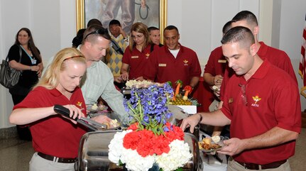 The Air Education and Training Command  2010 Outstanding Airmen/First Sergeant/Honor Guard Of The Year nominees and spouses attend a social function at the Randolph Air Force Base "Taj" on 16 March.  The nominees enjoy a variety of food and drinks provided by the Randolph Air Force Base Parr Officer Club and they were given a tour of the "Taj" and an opportunity to go to the top of the "Taj" to take in the spectacular view of Randolph Air Force Base and the surrounding community.  (U.S. Air Force Photo by Don Lindsey)  