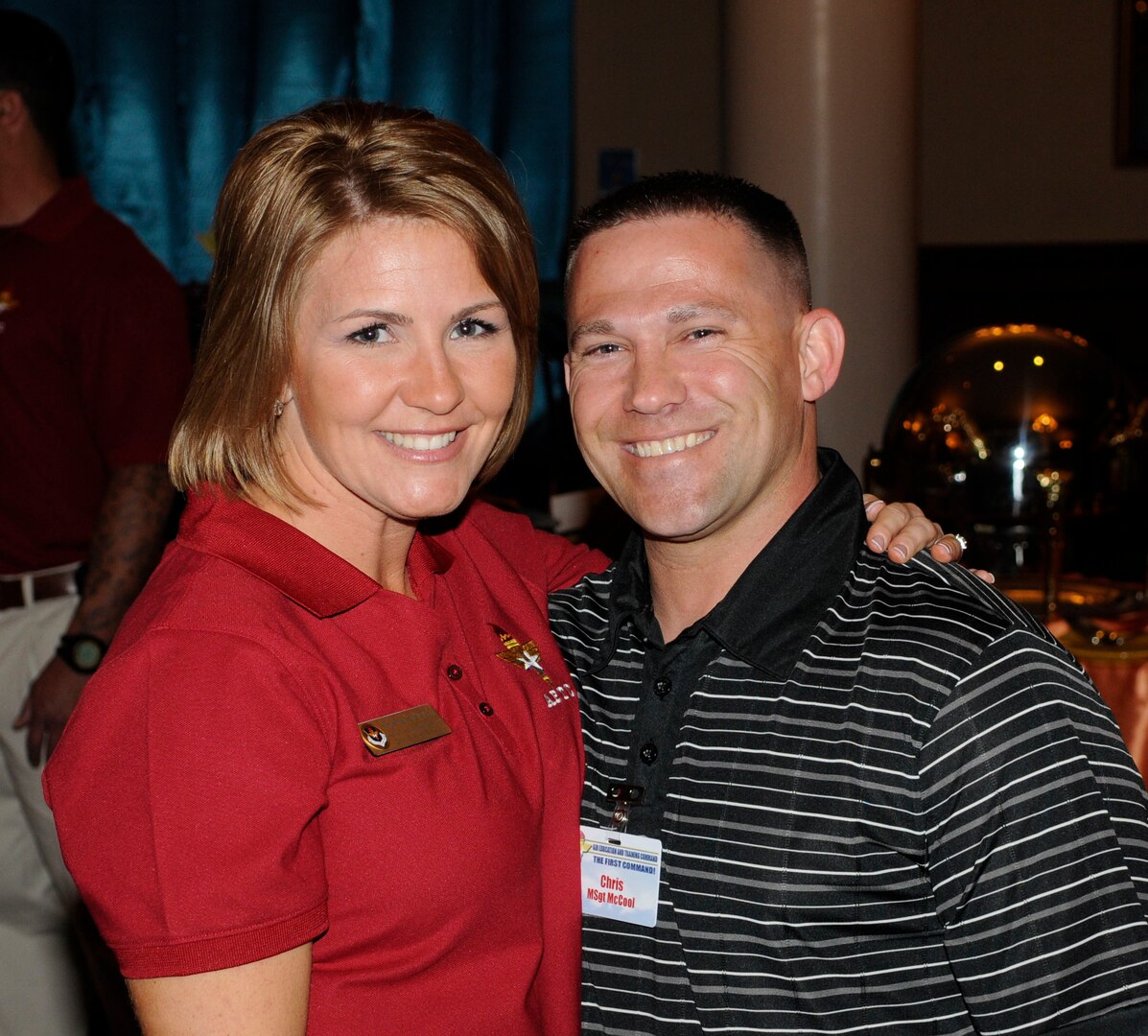 Senior Master Sergeant Kathleen McCool, a 2010 Outstanding Airman Nominee and her husband Master Sergeant  Chris  McCool, both assigned to Air Force Recruiting Services, Randolph Air Force Base, Texas, enjoy the Ice Breaker Social for all the 2010 Outstanding Airmen Of The Year nominees at the Randolph Air Force Base Parr Officer Club March 14. (U.S. Air Force Photo By Don Lindsey)