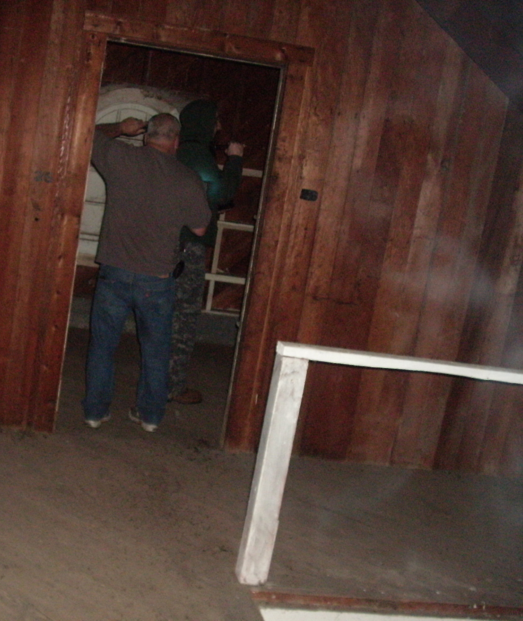 VANDENBERG AIR FORCE BASE, Calif. - This photograph was taken in the early morning of Sunday, March 13, 2011, at Vandenberg’s boathouse.  Edward Smith Jr., a 30th Civil Engineer Squadron electrical section foreman, and his crew visited the boathouse in hopes to capture paranormal activity with surveillance equipment. This photo shows a strange mist coming from the boathouse’s floor. (Courtesy photo) 