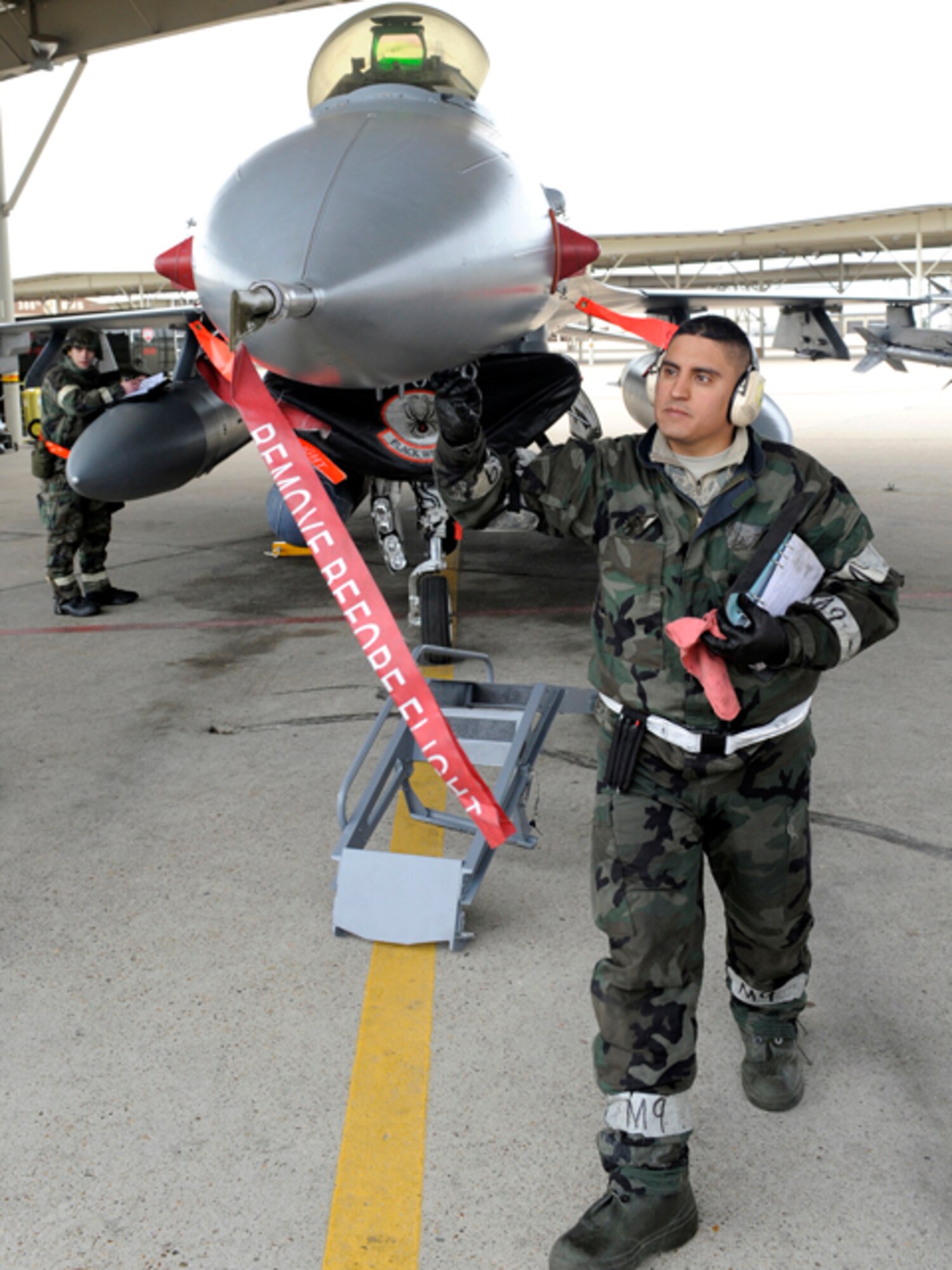 Tech. Sgt. Mike Vigil, crew chief in the 419th Aircraft Maintenance Squadron, inspects an F-16 as part of preflight preparations during the joint Operational Readiness Inspection last week. During the ORI, Air Combat Command evaluators conducted a meticulous review of Hill Airmen’s cooperative ability to deploy, respond to emergency situations, and their capacity to survive and operate in an austere environment. The ACC inspection team determined the 419th and 388th Fighter Wings capable of carrying out their combat mission. (U.S. Air Force photo/Todd Cromar) 