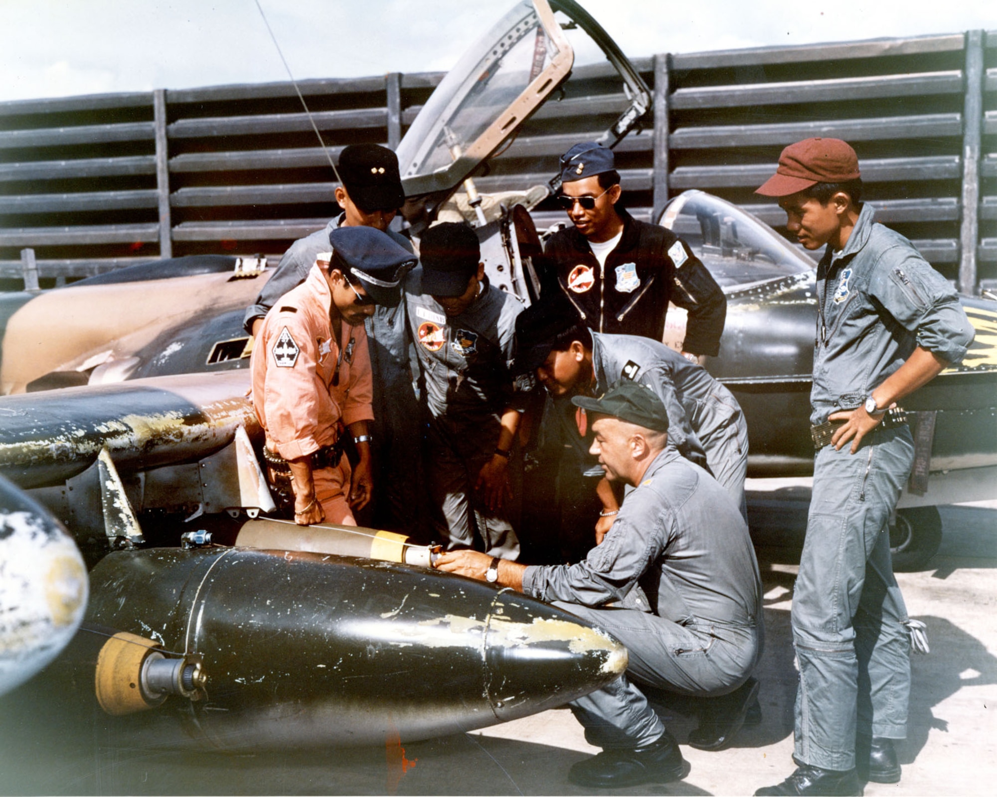 South Vietnamese pilots learn from an American instructor. (U.S. Air Force photo)