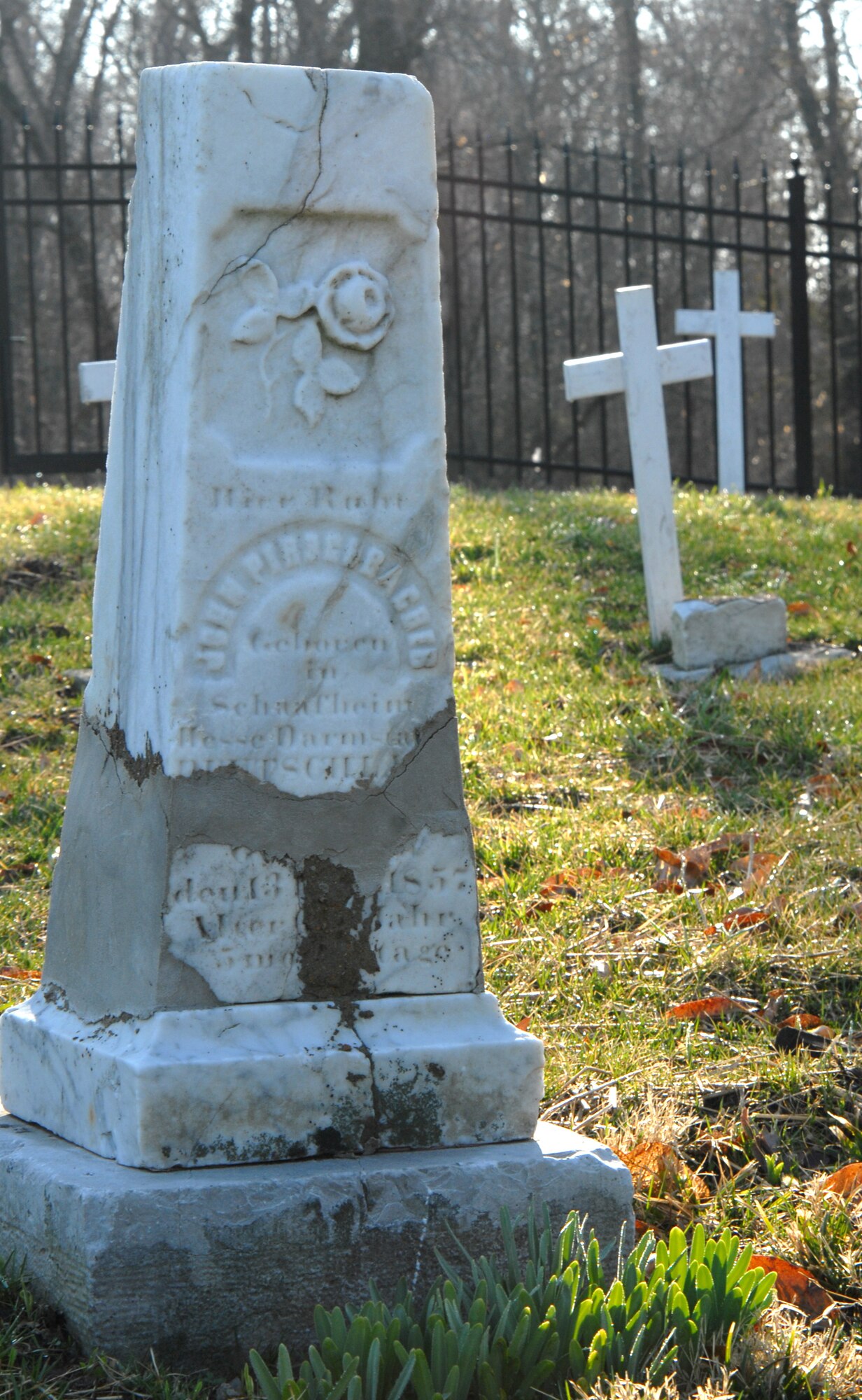 SCOTT AIR FORCE BASE, Ill. --   An obelisk, column gravestone marks the burial site of Johanne “John” Perschbacher who immigrated to what is now Scott Air Force Base in 1833 from Germany. The cemetery is one of two mid-nineteenth century pioneer family gravesites located on the base.  (U.S. Air Force Photo by Senior Airman Andrew Davis)