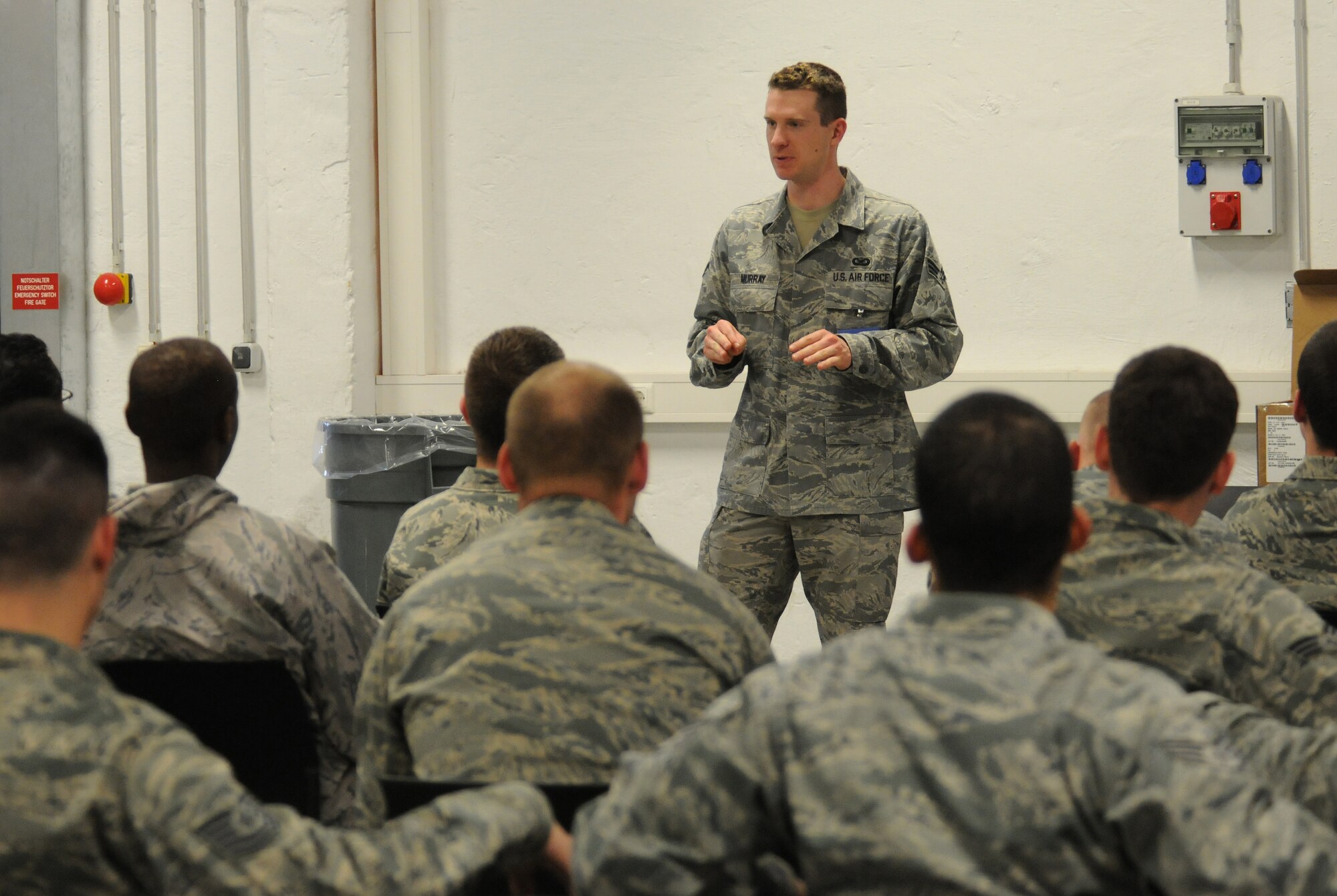 SPANGDAHLEM AIR BASE, Germany – Senior Airman Clayton Murray, 52nd Fighter Wing Public Affairs, briefs Airmen here before they deploy in support of Operation Odyssey Dawn March 20. Joint Task Force Odyssey Dawn is the U.S. Africa Command task force established to provide operational and tactical command and control of U.S. military forces supporting the international response to the unrest in Libya and enforcement of United Nations Security Council Resolution (UNSCR) 1973. UNSCR 1973 authorizes all necessary measures to protect civilians in Libya under threat of attack by Qadhafi regime forces.  JTF Odyssey Dawn is commanded by U.S. Navy Admiral Samuel J. Locklear, III. (U.S. Air Force photo/Staff Sgt. Benjamin Wilson)