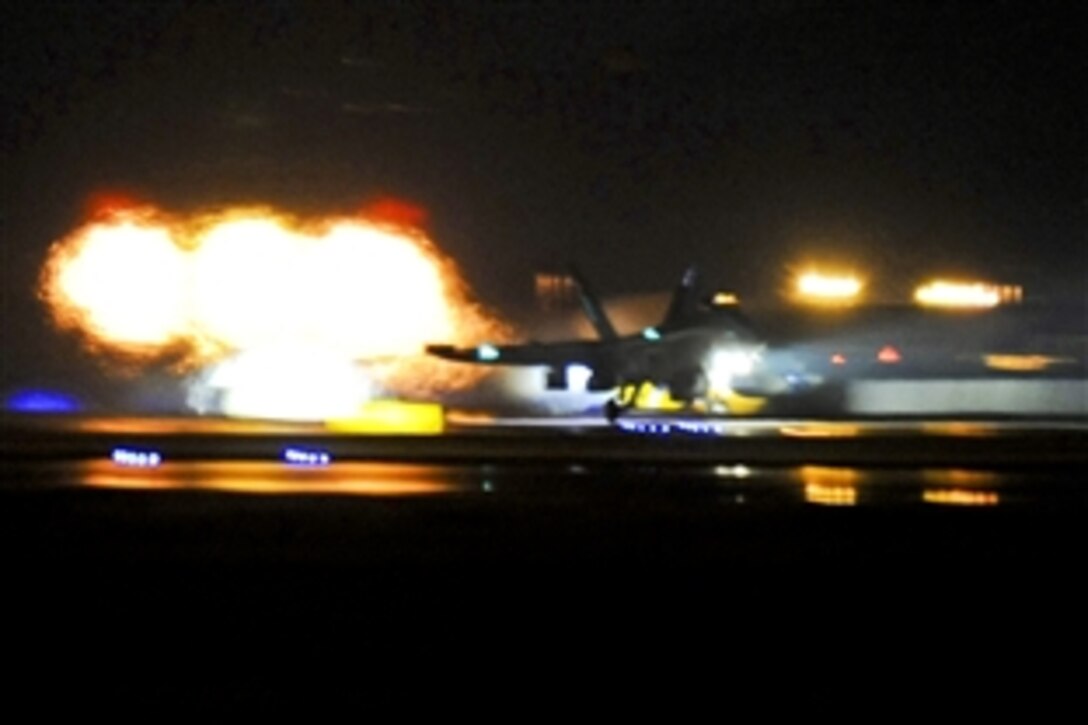 A U.S. Navy EA-18G Growler takes off from Aviano Air Base, Italy, to support the initial phase of Operation Odyssey Dawn, March 20, 2011. Joint Task Force Odyssey Dawn is the U.S. Africa Command task force established to support the larger international response to the unrest in Libya.