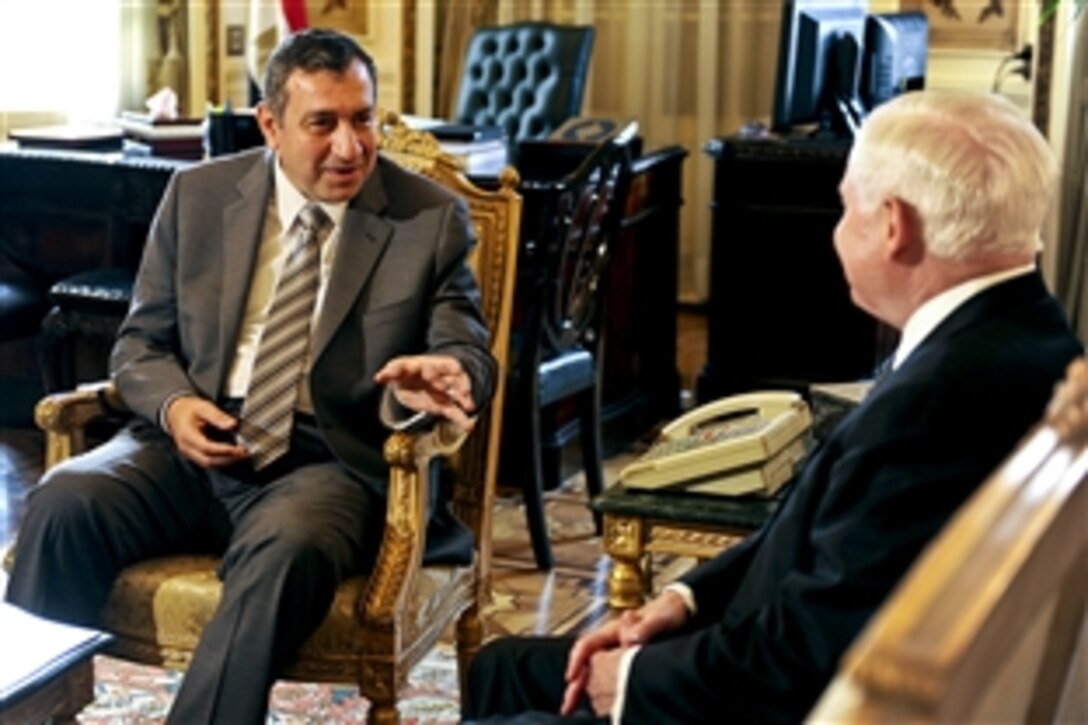 U.S. Defense Secretary Robert M. Gates, right, meets with Egyptian Prime Minister Essam Sharaf in Cairo, March 23, 2011.  