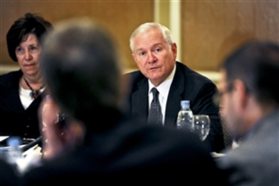 U.S. Defense Secretary Robert M. Gates speaks with members of the press after meeting with Egyptian Prime Minister Essam Sharaf while U.S. Ambassador to Egypt Margaret Scobey, left, looks on in Cairo, March 23, 2011.