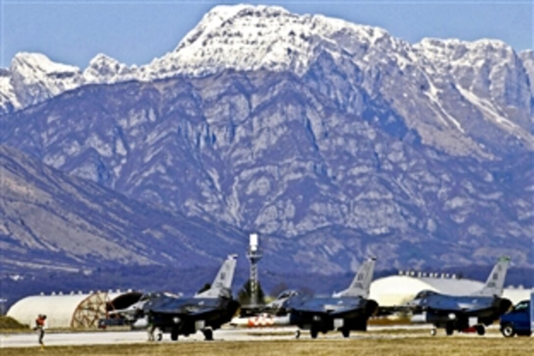 U.S. Air Force F-16 Fighting Falcons return to Aviano Air Base, Italy, March 20, 2011, after supporting Operation Odyssey Dawn. Joint Task Force Odyssey Dawn is the U.S. Africa Command task force supporting the larger international response to the unrest in Libya.