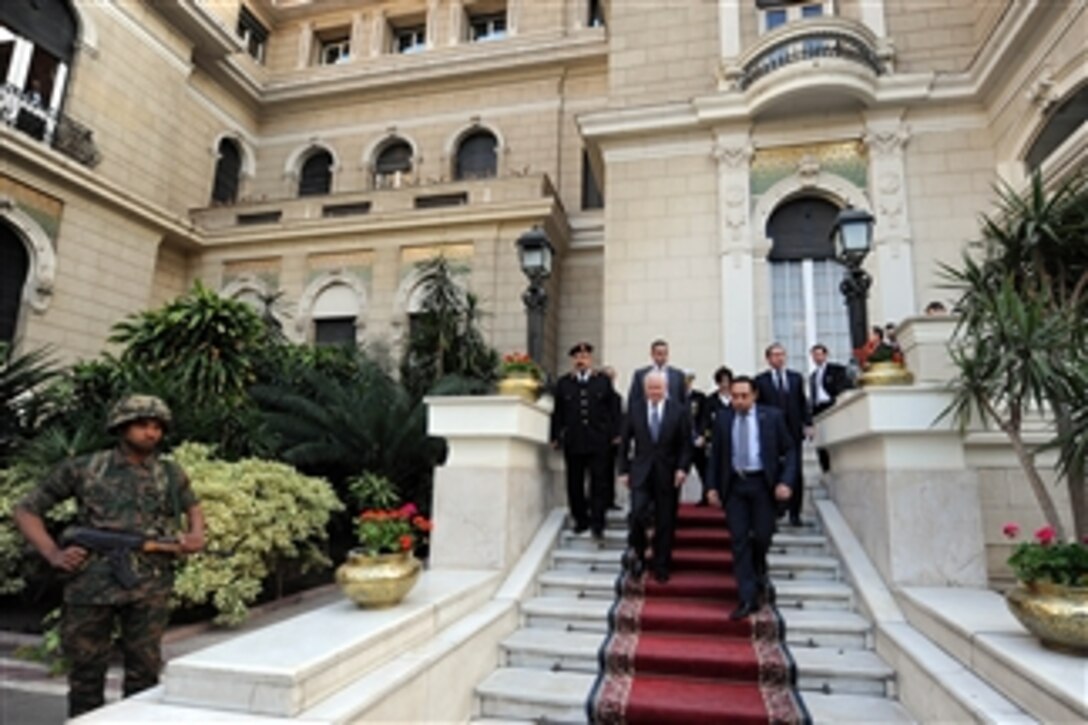 Secretary of Defense Robert M. Gates leaves the office of Egyptian Prime Minister Essam Sharaf after meetings in Cairo, Egypt, on March 23, 2011.  