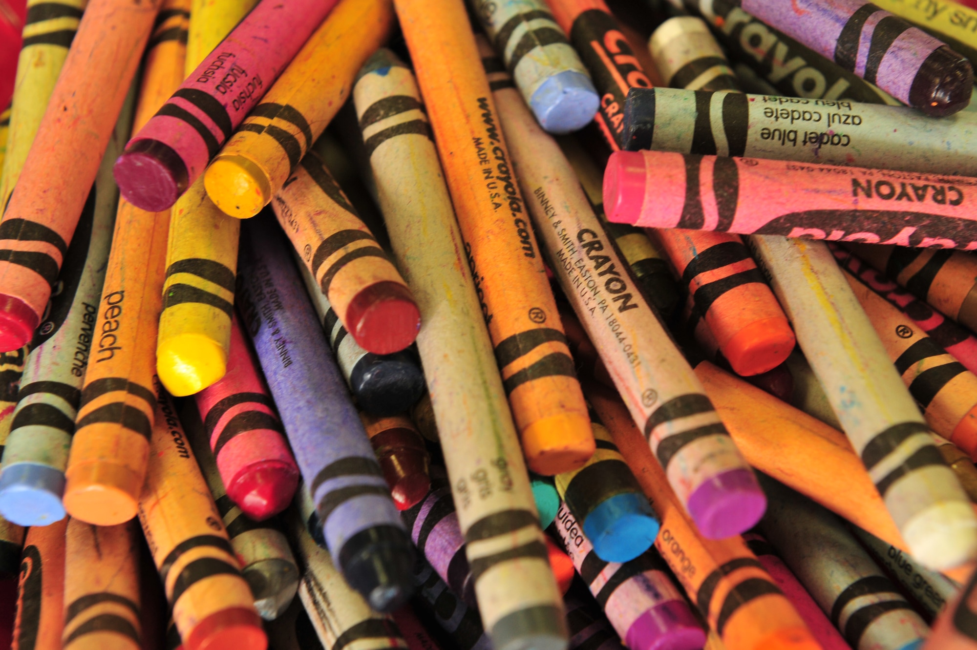 Colorful crayons await children's hands prior to the start of Petite Picasso, at the Cannon Air Force Base, N.M. library, March 24, 2011. Petite Picasso, run by the Cannon AFB library, provides art instruction to young children free of charge, for more information call 575-784-2786. (U.S. Air Force photo by Tech Sgt. Josef Cole)(RELEASED) 

