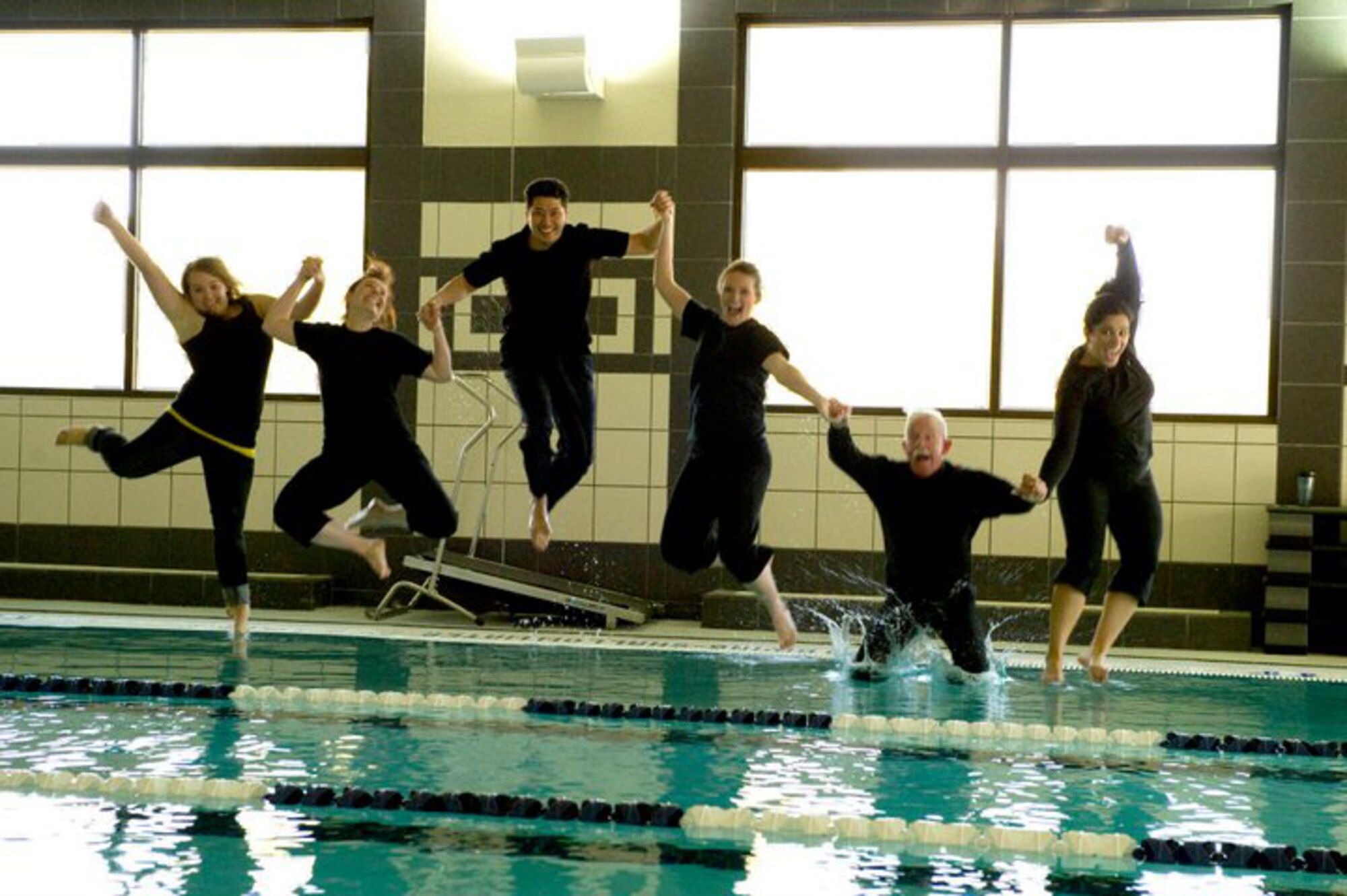 HOLLOMAN AIR FORCE BASE, N.M. -- The 49th Force Support Squadron Marketing Office demonstrates their “ALL IN” attitude by jumping ‘all in’ to the Domenici Fitness and Sports Center indoor pool recently. The Holloman Marketing team was recently named best in Air Combat Command for 2010. Their mission is to ensure programs and events on base are successful and that people know about them. They’ve done this by reaching out to the base through multiple events last year including the Big Give and Hollognome Projects. (Courtesy photo) 