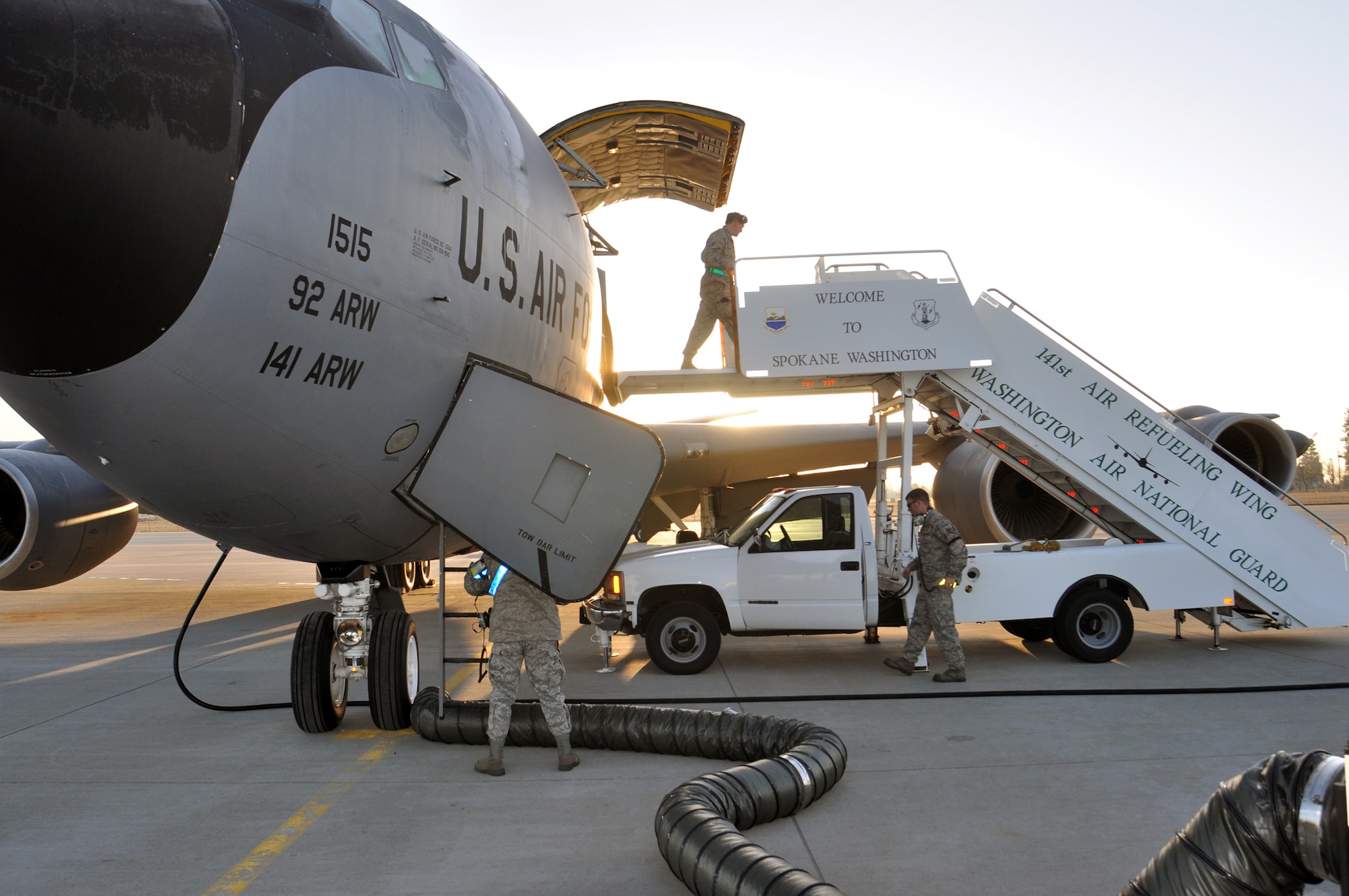 92nd and 141st Air Refueling Wings maintenance crews perform preflight inspections on a KC-135 Stratotanker prior to its take off from Spokane International Airport to support operation Odyssey Dawn March 23, 2011. Tankers will provide fuel to Air Force, Navy and NATO fighter aircraft through out the operation. (U.S. Air Force photo/ Master Sgt. Ronal Van Ausdal)