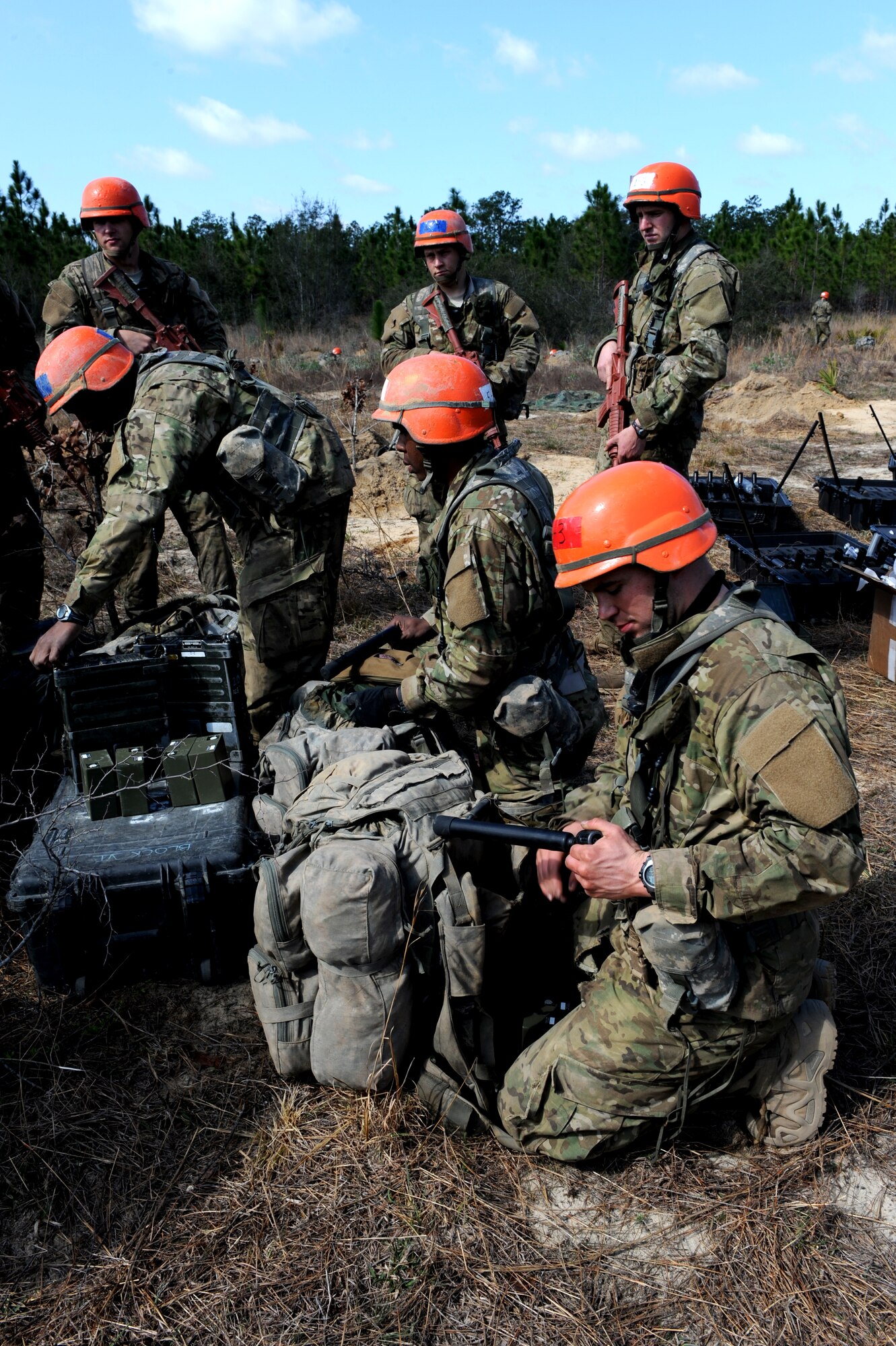U.S. Air Force Tactical Air Control Party candidates from Falcon Flight 86 set up radio equipment for a field training exercise, Eglin Air Force Base Range, Fla., March 10, 2011. The week-long FTX is the culmination of everything Falcon Flight 86 has learned thus far in training, testing the class both physically and mentally. (U.S. Air Force photo by Airman 1st Class Caitlin O'Neil-McKeown/RELEASED)


