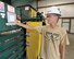 Robbie Evans, 704th Mission Support Group’s Base Services’ lead for AEDC’s recycling center, points to the touch-screen monitor on the Resource Recovery and Recycling Program’s recently acquired baler. (Photos by Rick Goodfriend)