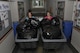 ATA employees Vickie Seals (left) and Andrea Stephens (right) prepare to deliver materials to the certified Cintas driver as part of the recent bulk shred day, June 18. (Photo by: Rick Goodfriend)