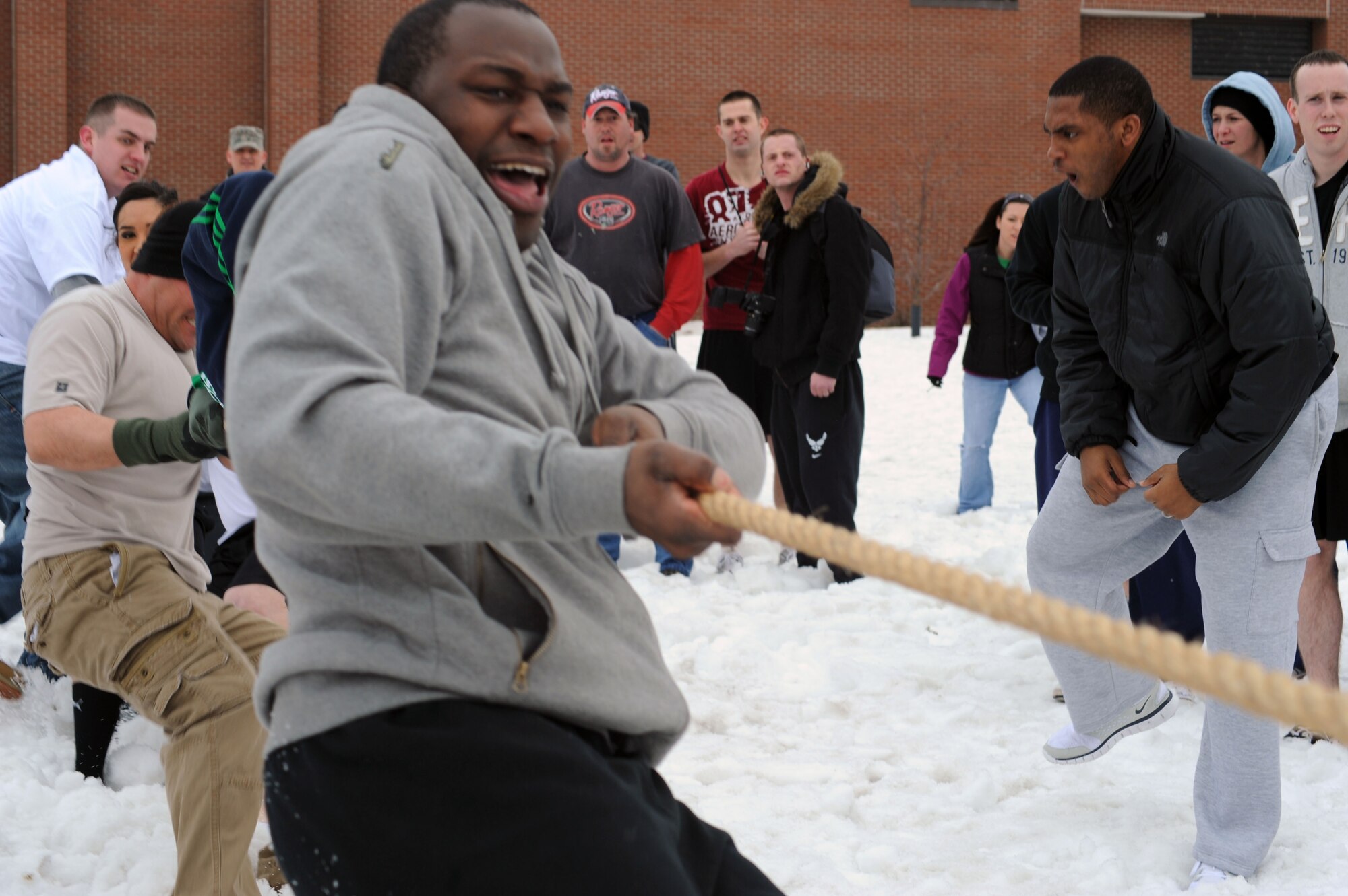 Airman 1st Class Steven Bridges, 319th Logistics Readiness Squadron, works to earn his side the advantage during a game of tug-of-war Mar. 17 outside the base fitness center during the base’s annual Winter Bash competitions. (U.S. Air Force photo by Airman 1st Class Amber Bennett)