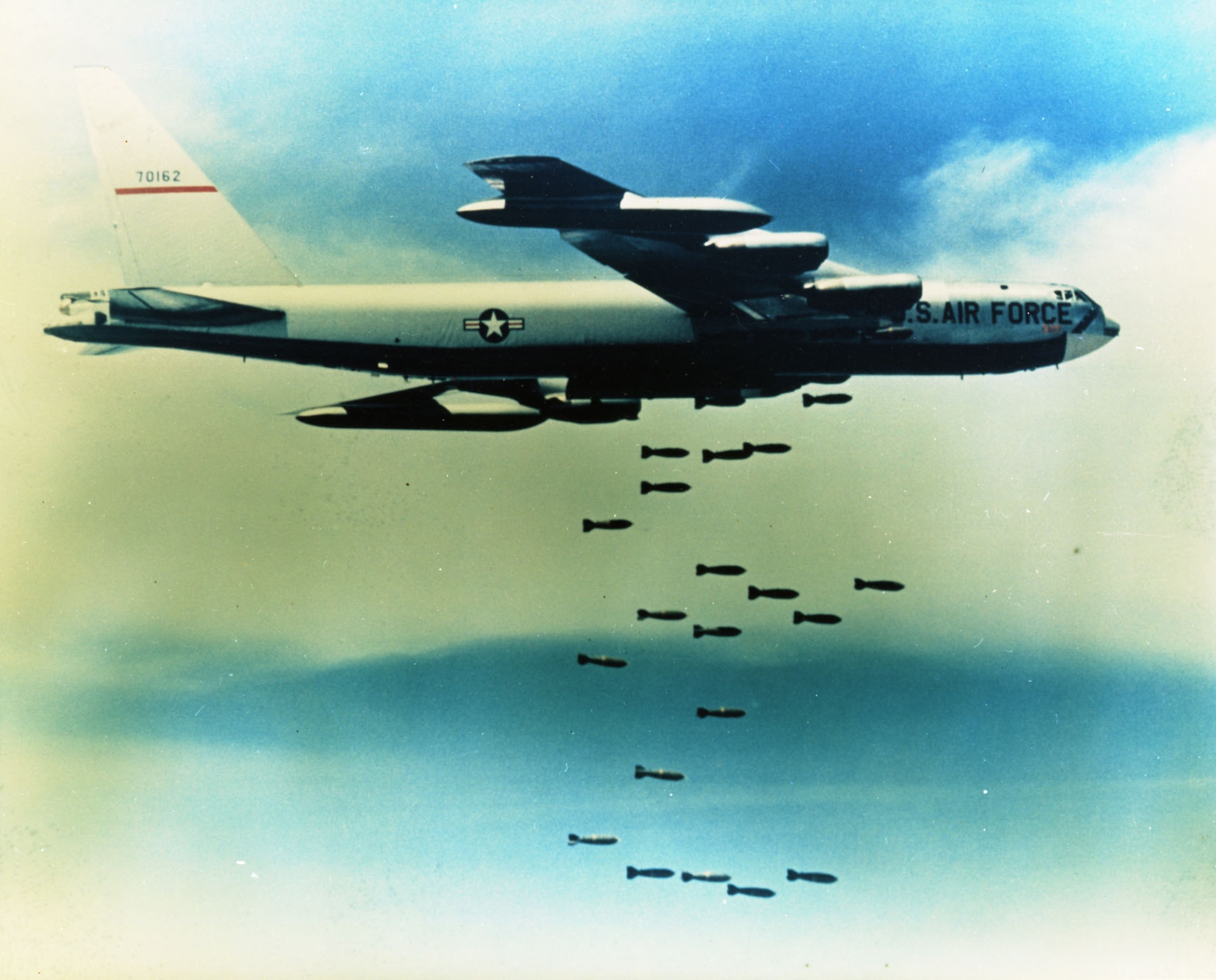 A B-52F dropping its bombs over Southeast Asia. (U.S. Air Force photo)