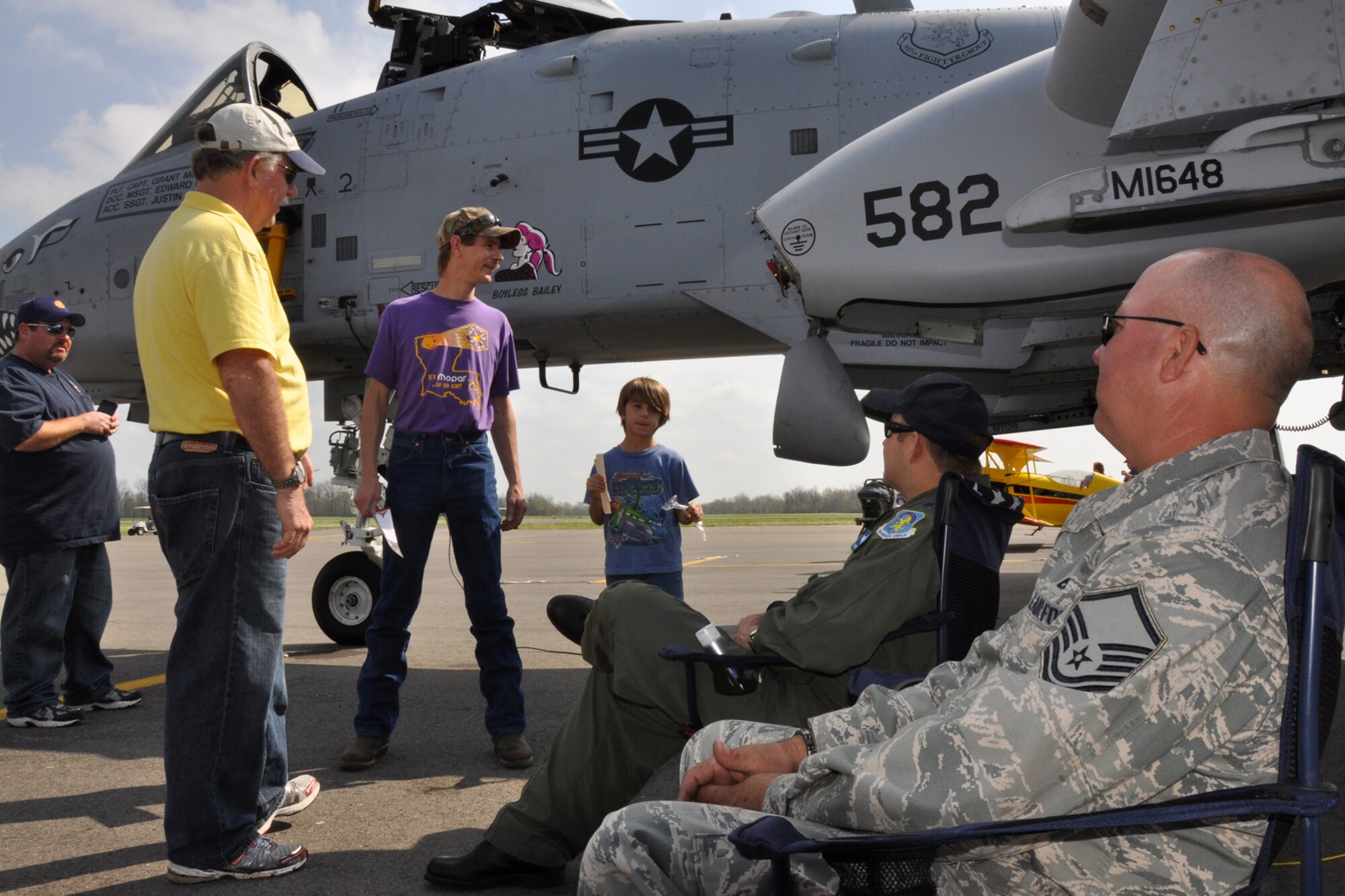 Lt. Col. James Marks, commander, 917th Operations Support Flight, and Master Sgt. Edward Fairchild, dedicated crew chief, answer questions about the A-10 Thunderbolt at the “Wings Over The Red Fly-In and Airport Open House” hosted by the Experimental Aircraft Associate, Chapter 343 at the Shreveport Downtown Airport in Shreveport, La., March 19, 2011. More than 24 static displays were available for visitors to view at the event. (U.S. Air Force photo/Tech. Sgt. Jeff Walston)