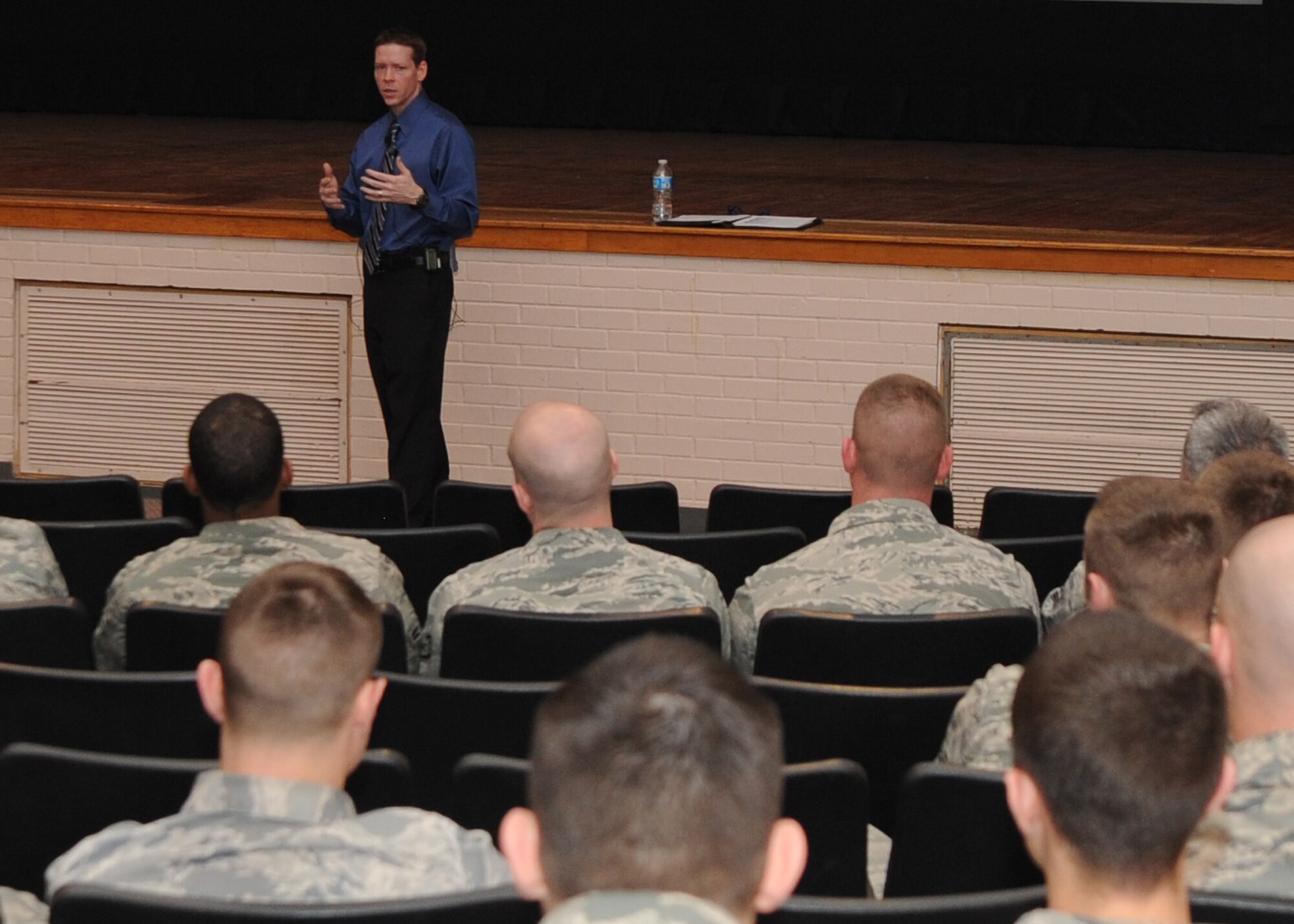 Dr. Jason Deselms, Robert J. Dole Veterans Affairs Medical Center suicide prevention coordinator, speaks to Team McConnell Airmen March 18, 2011, McConnell Air Force Base, Kan. Mr. Deselms discussed how to identify individuals at risk for suicide, intervene and prevent suicide. The briefing helped McConnell’s Airmen identify factors contributing to suicide and develop a response to reduce the impact of such factors. (U.S. Air Force photo/Airman 1st Class Katrina M. Brisbin)
