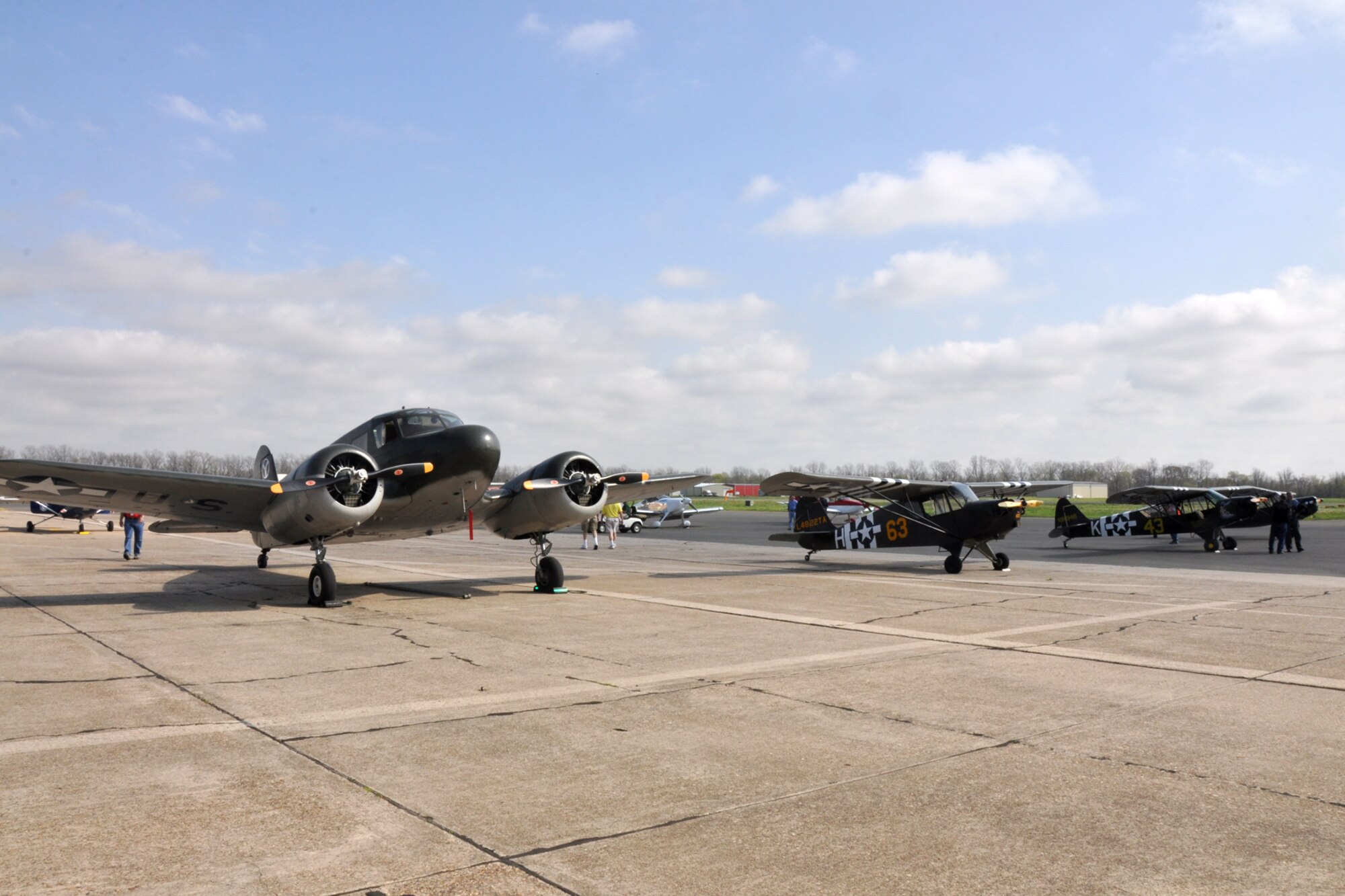 A row of vintage Army Air Corp aircraft sit on display at the “Wings Over The Red Fly-In and Airport Open House” hosted by the Experimental Aircraft Associate, Chapter 343 at the Shreveport Downtown Airport in Shreveport, La., March 19, 2011. More than 24 static displays were available for visitors to view at the event. (U.S. Air Force photo/Tech. Sgt. Jeff Walston)