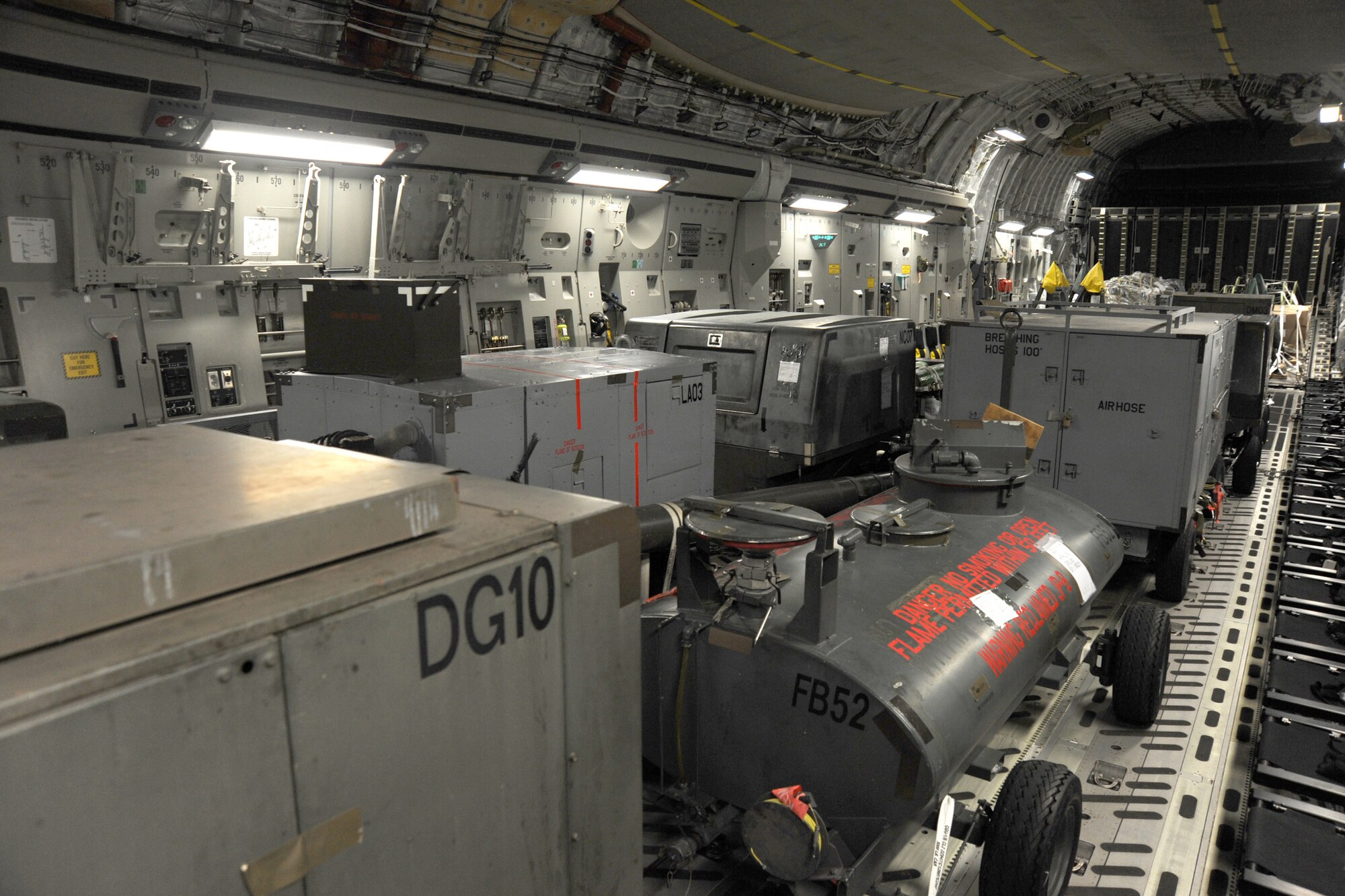 A U.S. Air Force C-17 Globemaster III from Travis Air Force Base, Calif. is loaded and ready to be flown to support Operation Odyssey Dawn March 20, 2011, McConnell Air Force Base, Kan. Joint Task Force Odyssey Dawn is the U.S. Africa Command task force established to provide operational and tactical command and control of U.S. military forces supporting the international response to the unrest in Libya and enforcement of United Nations Security Council Resolution 1973. UNSCR 1973 authorizes all necessary measures to protect civilians in Libya under threat of attack by Qadhafi regime forces. (U.S. Air Force Photo/Staff Sgt. Dallas Edwards) 