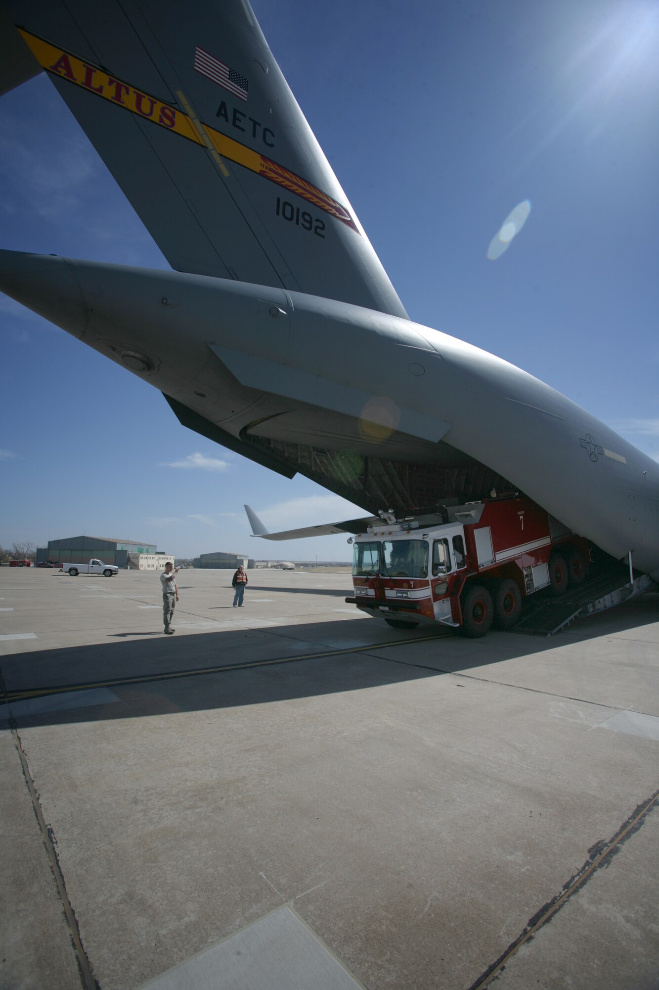 Airmen from Altus Air Force Base offload a firefighting crash truck at Henry Post Army Airfield on Fort Sill March 11. (Courtesy photo by James Brabenec)