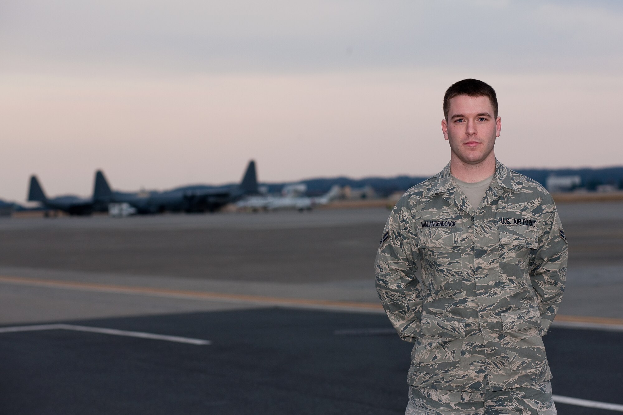 YOKOTA AIR BASE, Japan -- Airman 1st Class Andrew Vanlangendonck, 374th Operations Support Squadron, conducts airfield management at Yokota Air Base, Japan. A native of Williston, Florida, Airman Vanlangendonck files flight plans, performs airfield inspections, and provides general support to aircrew members. Along with his fellow Airmen, he has been working 12-hour shifts in support of Operation Tomodachi.  (U.S. Air Force photo/Osakabe Yasuo)