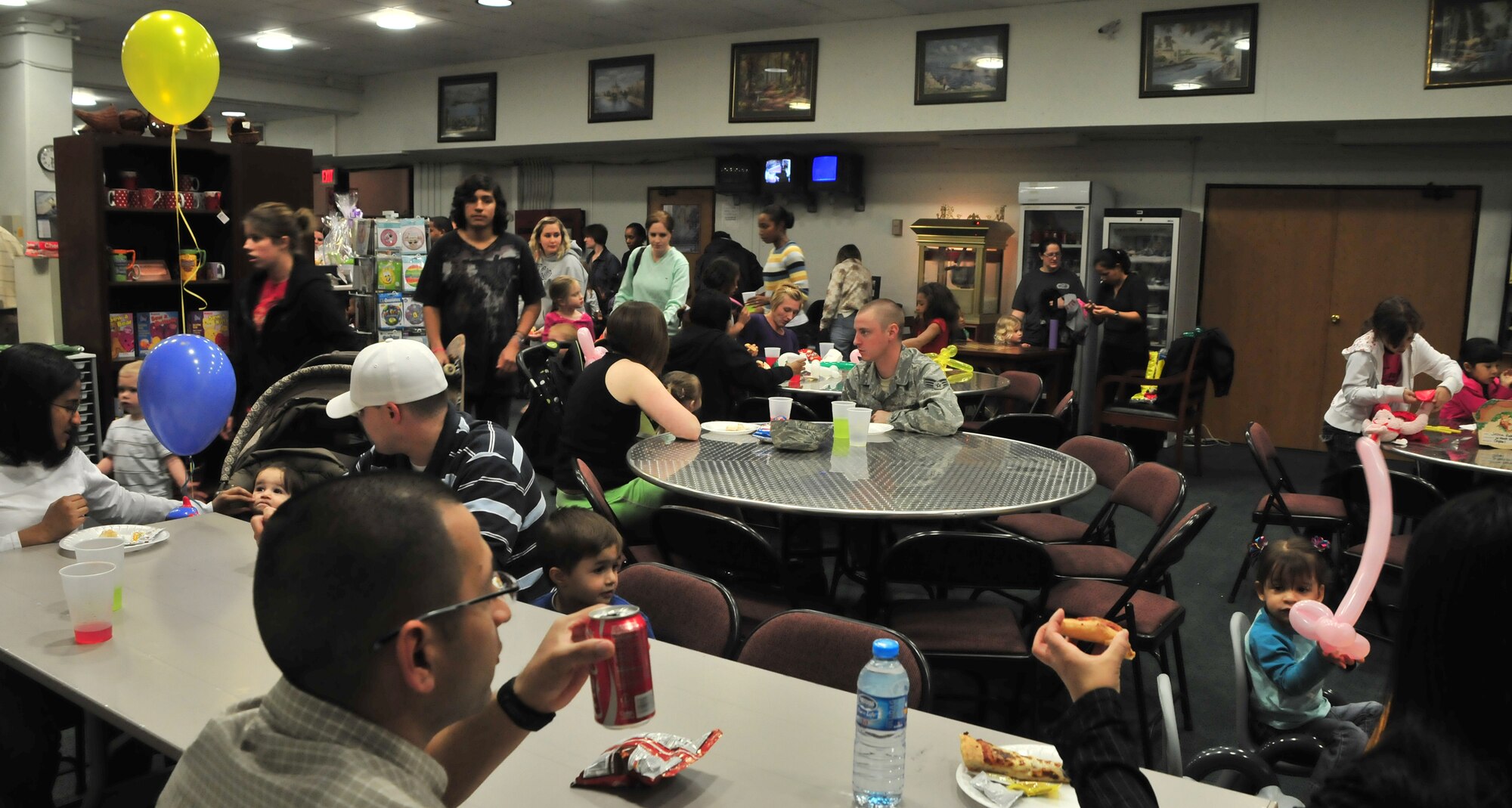 Airmen and their families attend the “Kids Karnival” at the Incirlik Community Center March 16, 2011, at Incirlik Air Base, Turkey.  During the carnival, families spent time together playing games, eating and participating in other activities. This event was held to boost the morale of Airmen and their families here at Incirlik, officials said. (U.S. Air Force photo by Staff Sgt. Alexandre Montes/Released)