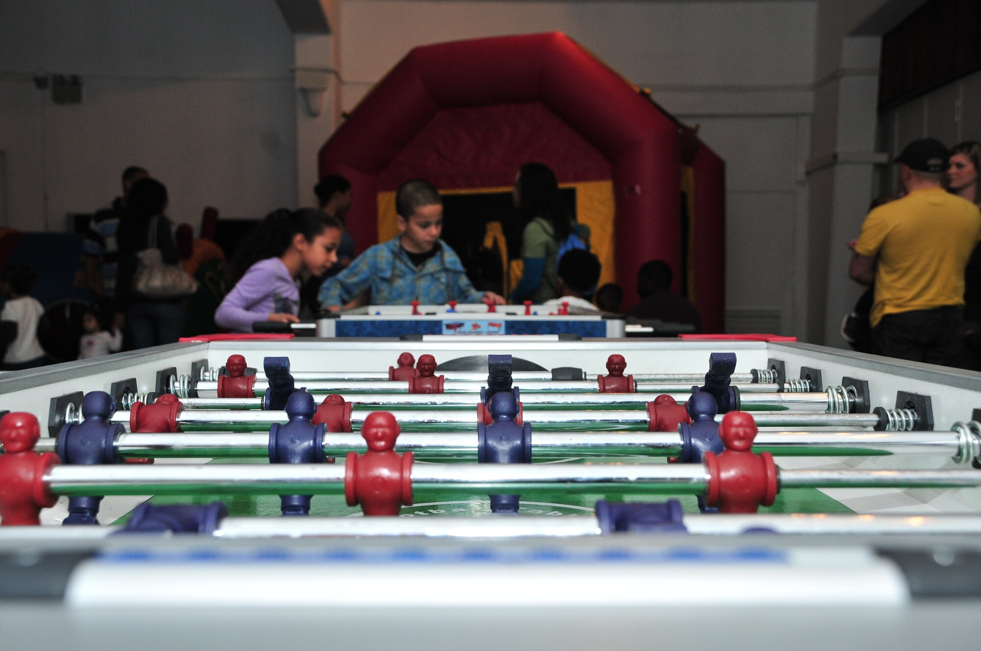 Airmen and their families attend the “Kids Karnival” at the Incirlik Community Center March 16, 2011, at Incirlik Air Base, Turkey.  During the carnival, families spent time together playing games, eating and participating in other activities. This event was held to boost the morale of Airmen and their families here at Incirlik, officials said. (U.S. Air Force photo by Staff Sgt. Alexandre Montes/Released)