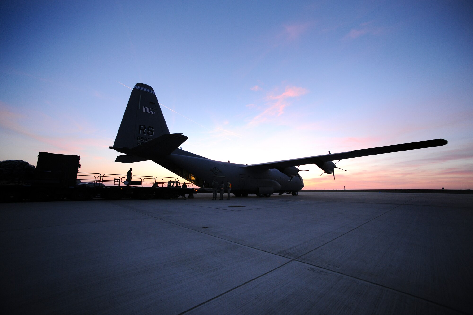 SPANGDAHLEM AIR BASE, Germany – A C-130J Super Hercules from the 37th Airlift Squadron, Ramstein Air Base, Germany, waits to be loaded with cargo here in support of Operation Odyssey Dawn March 21. Joint Task Force Odyssey Dawn is the U.S. Africa Command task force established to provide operational and tactical command and control of U.S. military forces supporting the international response to the unrest in Libya and enforcement of United Nations Security Council Resolution (UNSCR) 1973. UNSCR 1973 authorizes all necessary measures to protect civilians in Libya under threat of attack by Qadhafi regime forces.  JTF Odyssey Dawn is commanded by U.S. Navy Admiral Samuel J. Locklear, III. (U.S. Air Force photo/Senior Airman Nathanael Callon)