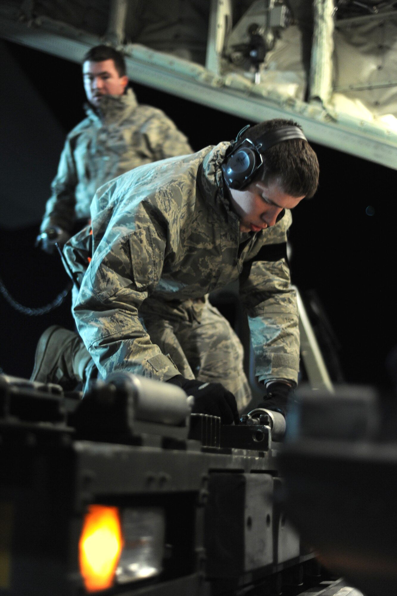 SPANGDAHLEM AIR BASE, Germany – An Airman from the 726th Air Mobility Squadron prepares to load cargo onto a C-130J Super Hercules here in support of Operation Odyssey Dawn March 20. Joint Task Force Odyssey Dawn is the U.S. Africa Command task force established to provide operational and tactical command and control of U.S. military forces supporting the international response to the unrest in Libya and enforcement of United Nations Security Council Resolution (UNSCR) 1973. UNSCR 1973 authorizes all necessary measures to protect civilians in Libya under threat of attack by Qadhafi regime forces.  JTF Odyssey Dawn is commanded by U.S. Navy Admiral Samuel J. Locklear, III. (U.S. Air Force photo/Senior Airman Nathanael Callon)