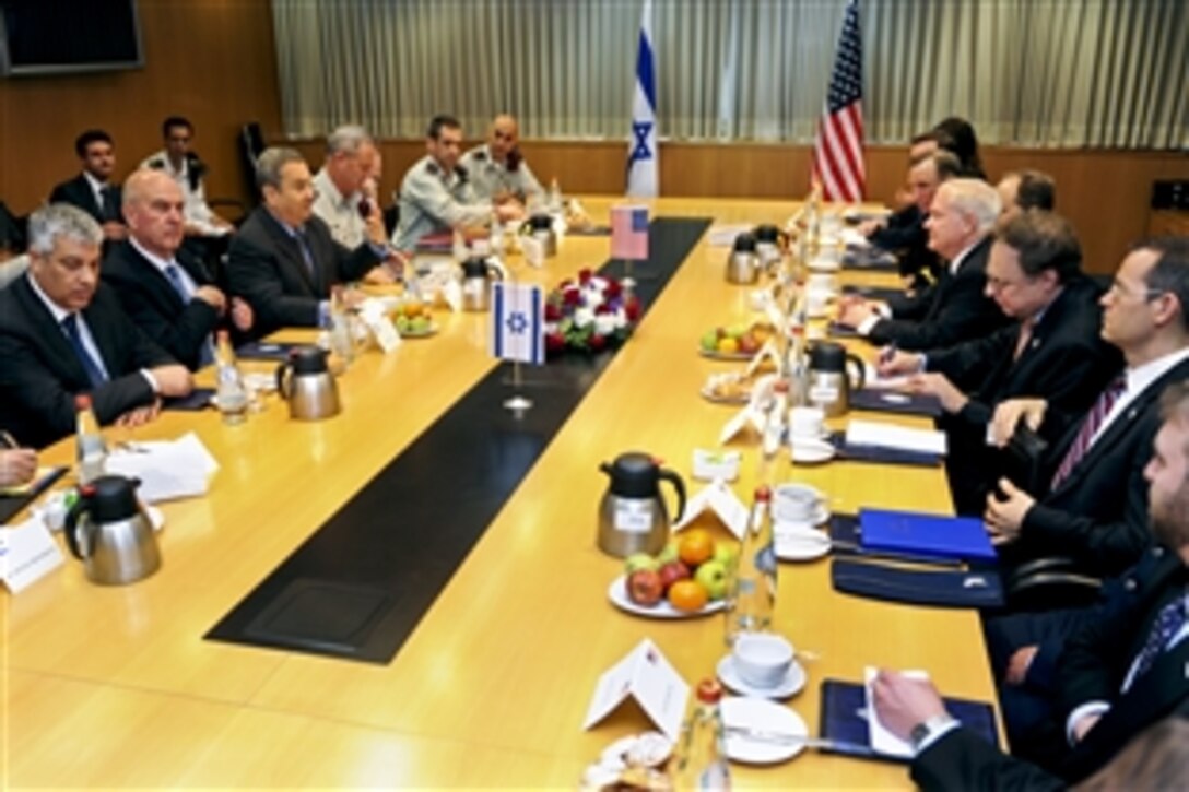 U.S. Defense Secretary Robert M. Gates, right forward, meets with Israeli Defense Minister Ehud Barak, left, in Tel Aviv, Israel, March 24, 2011.