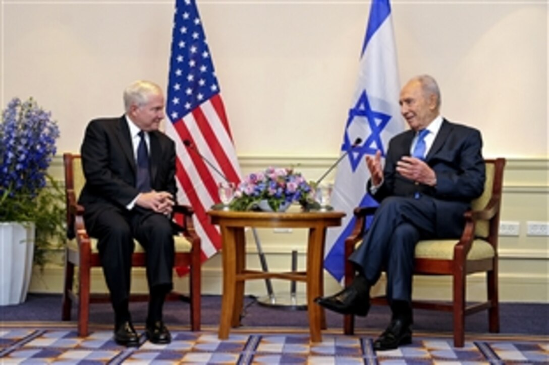 U.S. Defense Secretary Robert M. Gates meets with Israeli President Shimon Peres in Tel Aviv, Israel, March 24, 2011.