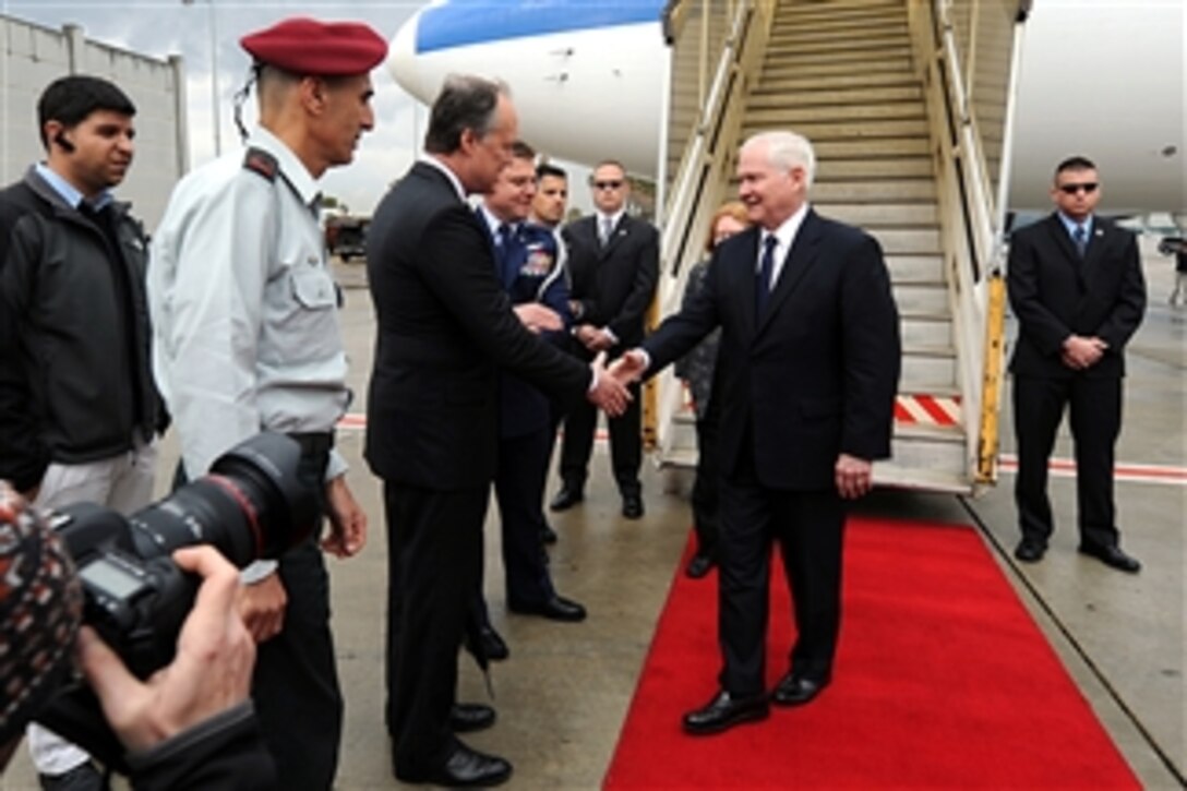 Secretary of Defense Robert M. Gates and his wife Becky are greeted by U.S. Ambassador to Israel James B. Cunningham after their arrival in Tel Aviv, Israel, on March 24, 2011.  