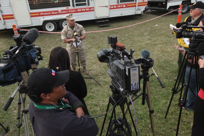 MARINE CORPS BASE CAMP LEJEUNE, N.C. – Col. Daniel Lecce, commanding officer for Marine Corps Base Camp Lejeune, talks to the press during a press conference at the SR-49 staging area aboard Marine Corps Base Camp Lejeune, March 25. The press conference was given to inform the public on the status of the fire, which had destroyed more than 9,382 acres.