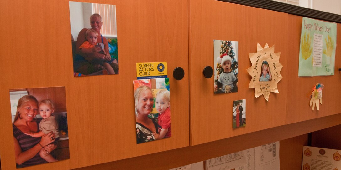 SSgt. Jamie J. Rae’s office is adorned with photos of her family and Marine Corps memorabilia. Rae, U.S. Marine Corps Forces, Pacific’s financial management resource analyst, proudly balances her Marine career with pursuing a master’s degree and supporting her family.