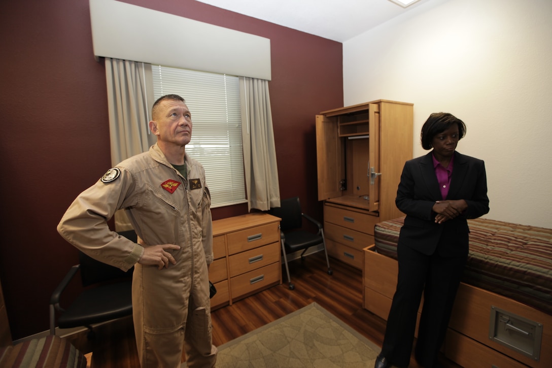 2nd Marine Aircraft Wing Commanding General Maj. Gen. Jon M. Davis and Tracy Spellman, the bachelor housing manager for Marine Corps Air Station Cherry Point, tour the air station's newest bachelor enlisted quarters March 25. After 16-months in the making, the new BEQs are the first new quarters aboard the air station in more than 20 years, and MCAS Cherry Point Commanding Officer Col. Philip J. Zimmerman said, “The standard for the new quarters was set with the Marines’ interest at hand.”